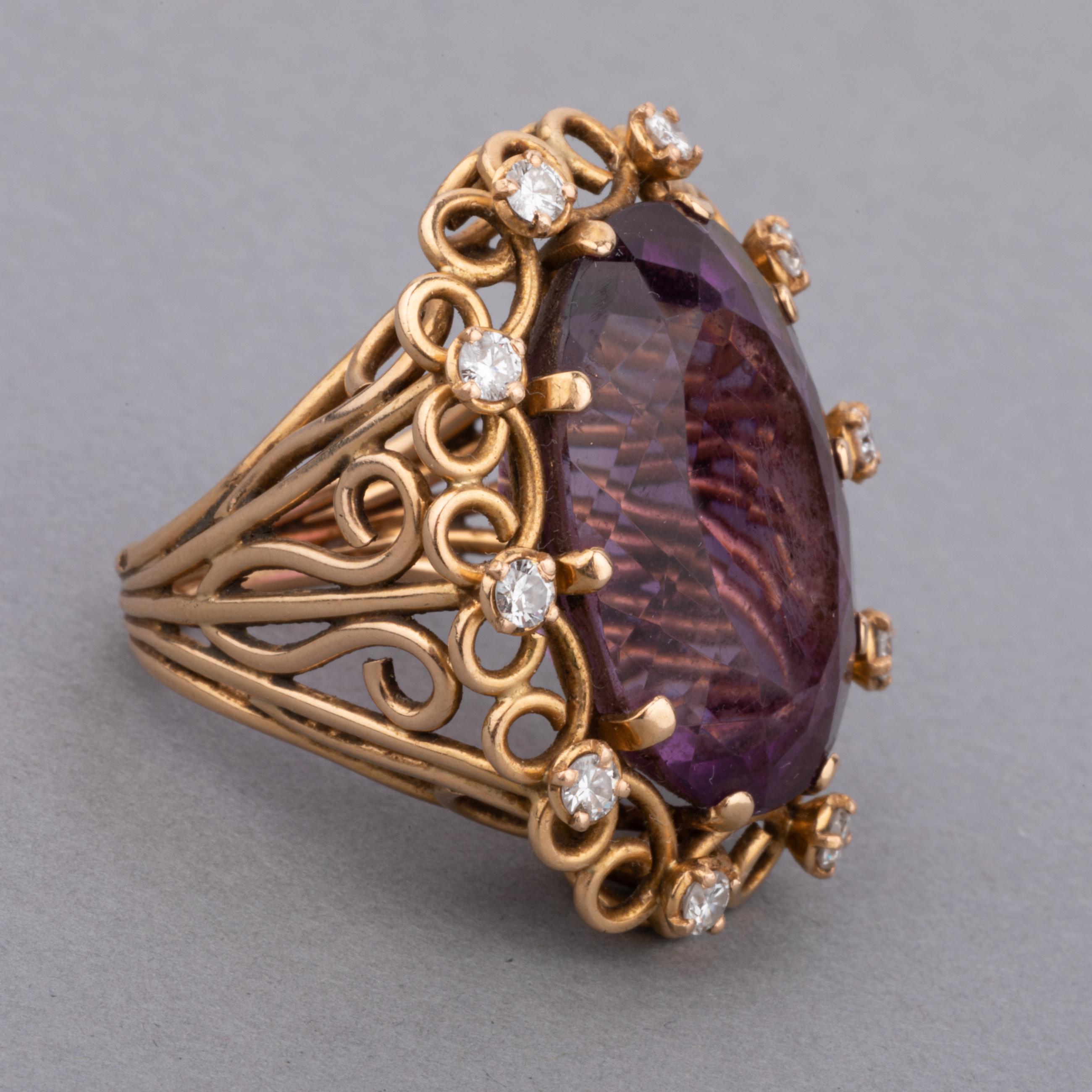 A beautiful vintage ring, made in France circa 1950. Made in yellow gold 18k and set with diamonds and a big Amethyst of 23 carats approximately.
Dimension of front: 33 and 16 mm.
Ring size: 52
18.60 grams