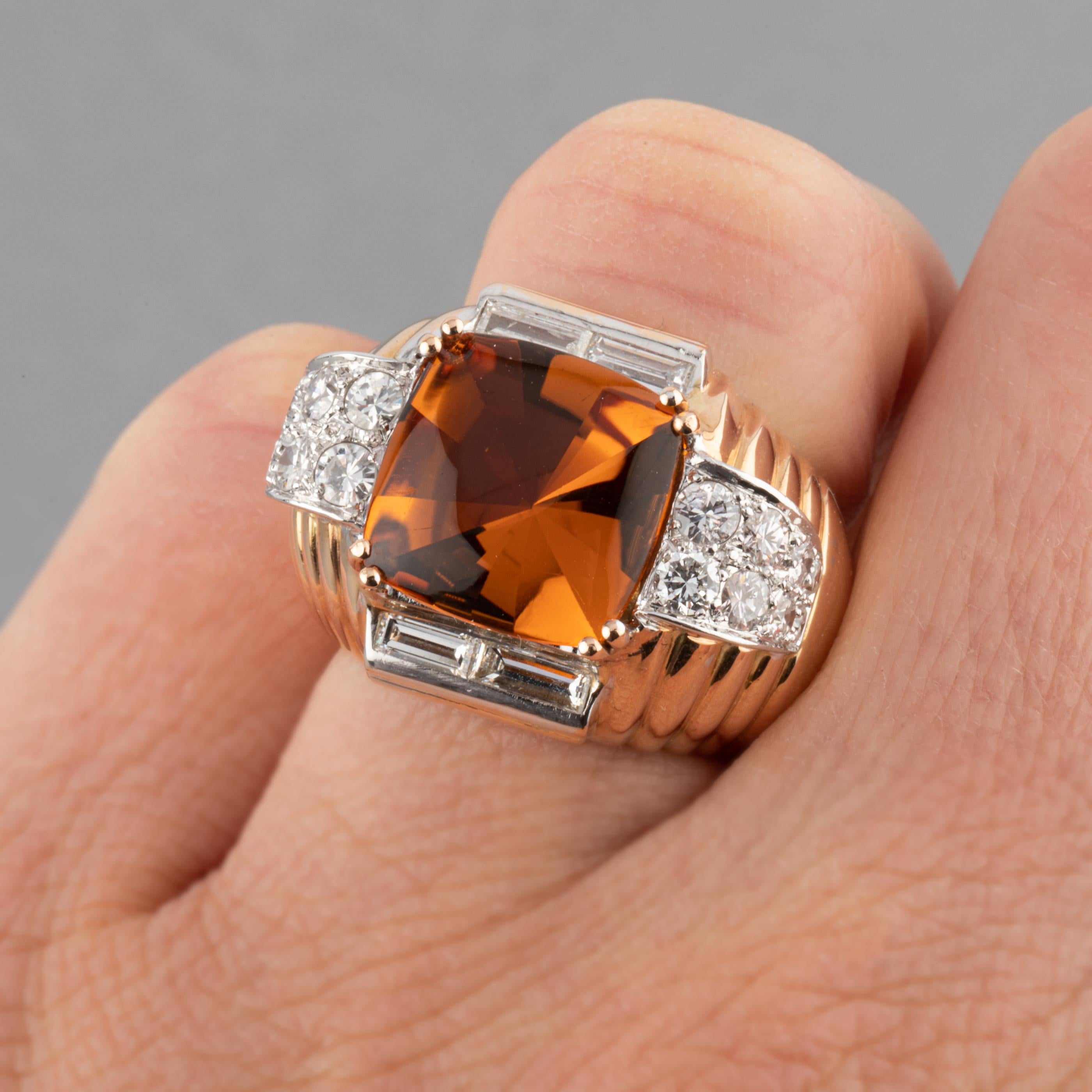 Elegant Ring, made in France circa 1950.
Made in yellow gold 18k and platinum, hallmarks for both (eagle and dog), mark of the maker.
Set with diamonds and a citrine. The citrine measures 12*13 mm. the diamonds weight 0.80 carat