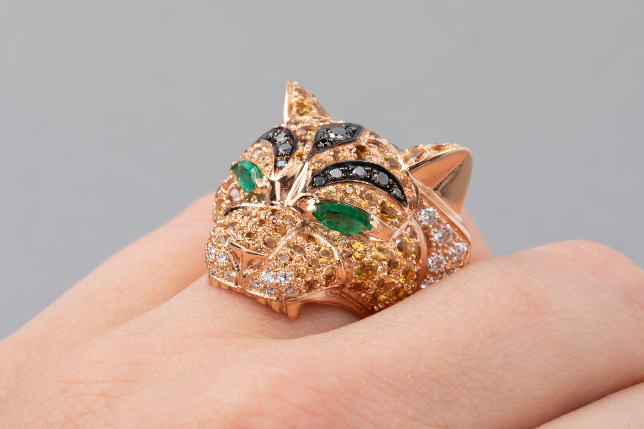 Gold Diamonds Emeralds and Sapphires Tiger Fashion Ring

Gold Diamonds Emeralds and Sapphires Tiger Ring  Very beautiful ring, representing a Tiger.  Made in France in rose gold 14k (Mark for gold 14k: the shell).  
The design is nice, the