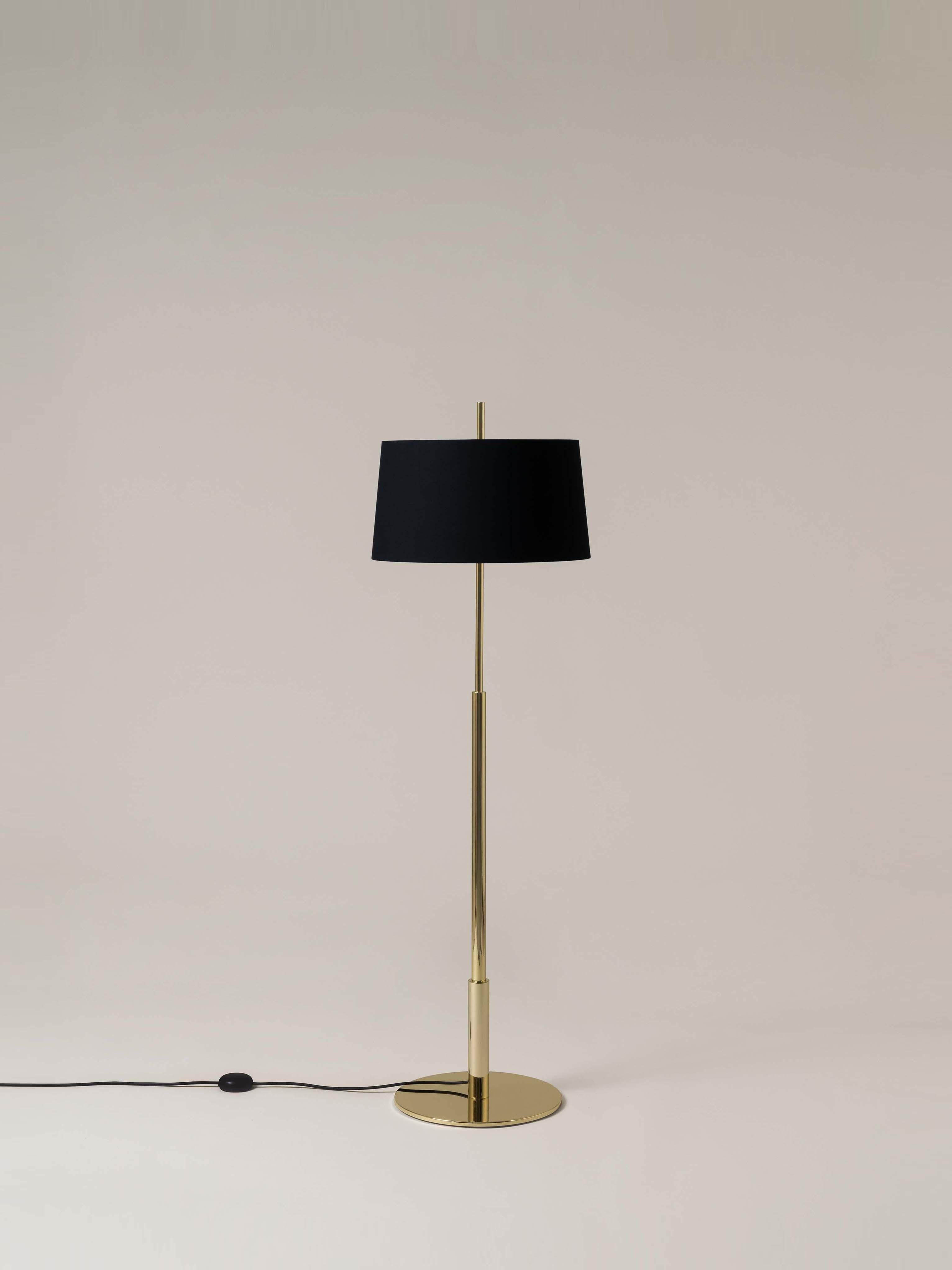 Gold diana floor lamp by Federico Correa, Alfonso Milá, Miguel Milá
Dimensions: D 45 x H 146 cm
Materials: Metal, linen.
Available in nickel or gold and in black or white shade.

In keeping with the calling of its creators, the Diana lamp has a