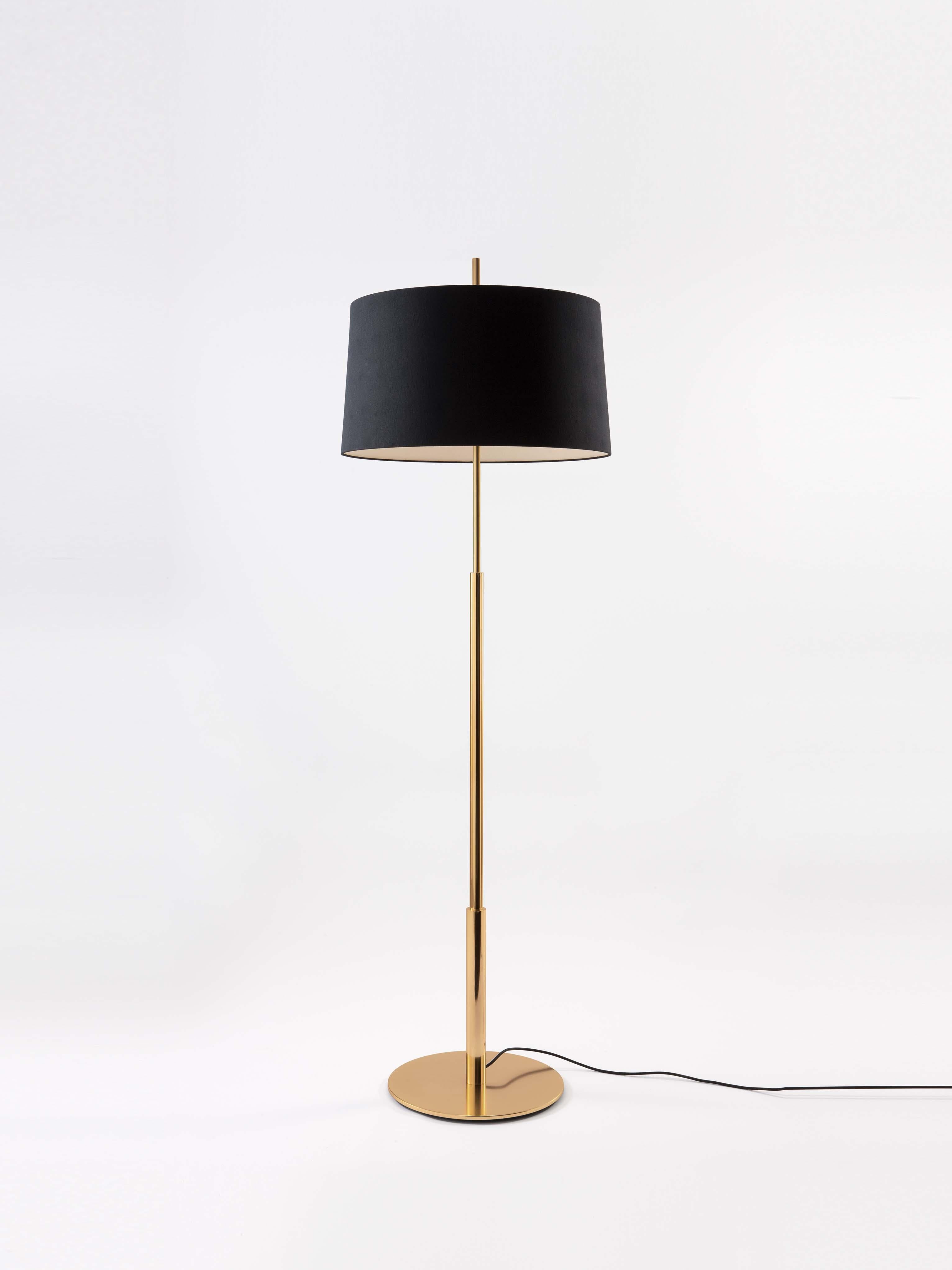 Gold Diana floor lamp by Federico Correa, Alfonso Milá, Miguel Milá
Dimensions: D 58 x H 183 cm
Materials: Metal, linen.
Available in nickel or gold and in black or white shade.

In keeping with the calling of its creators, the Diana lamp has a