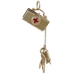 Gold Doctor's Bag with Medical Instruments