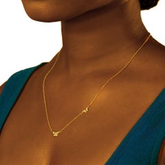Collier double papillon en or