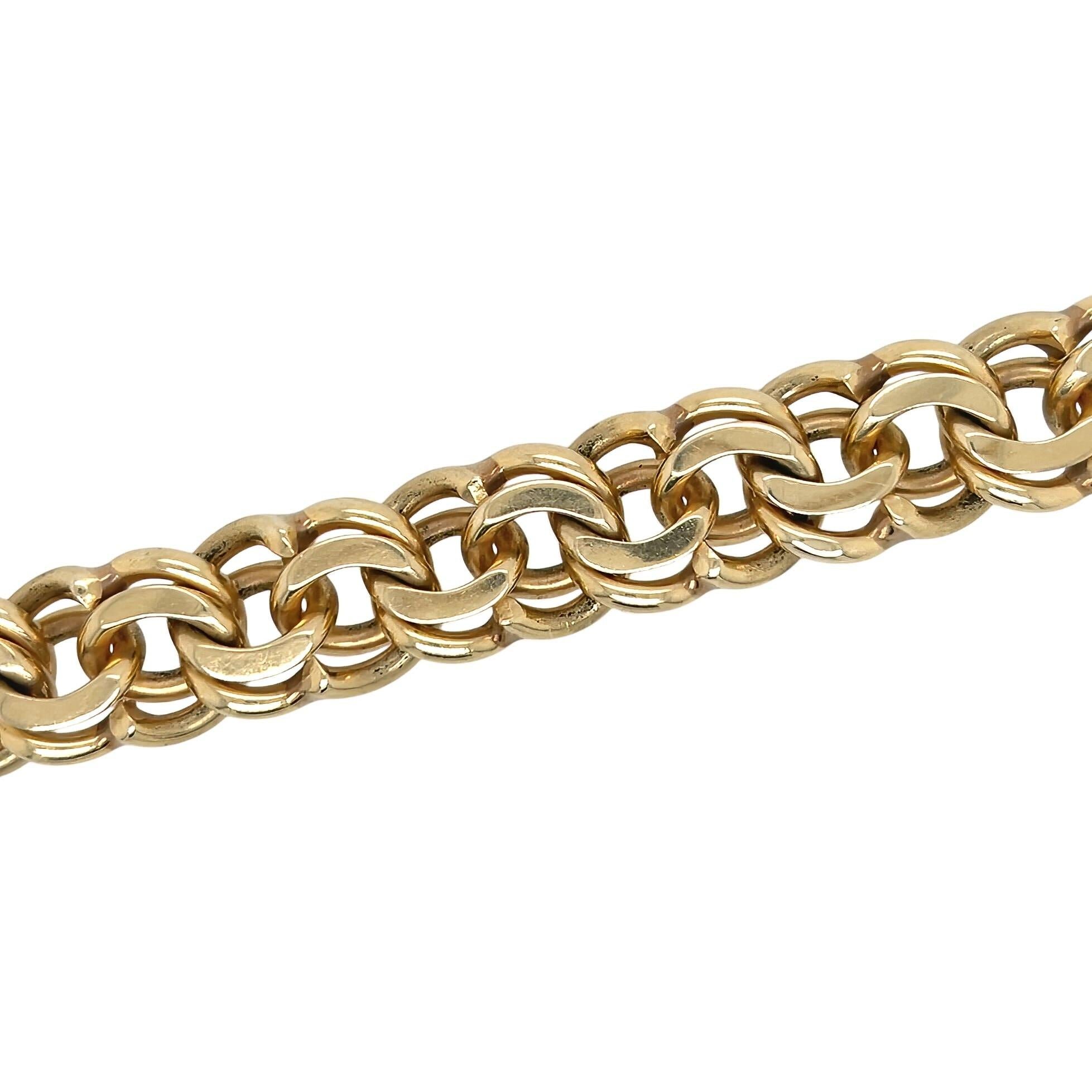 A 14 karat yellow gold bracelet.  Designed as a modified double curb link bracelet.  Length approximately 7 7/8 inches; width approximately 5/8 inch.  Gross weight approximately 115.7 grams.




