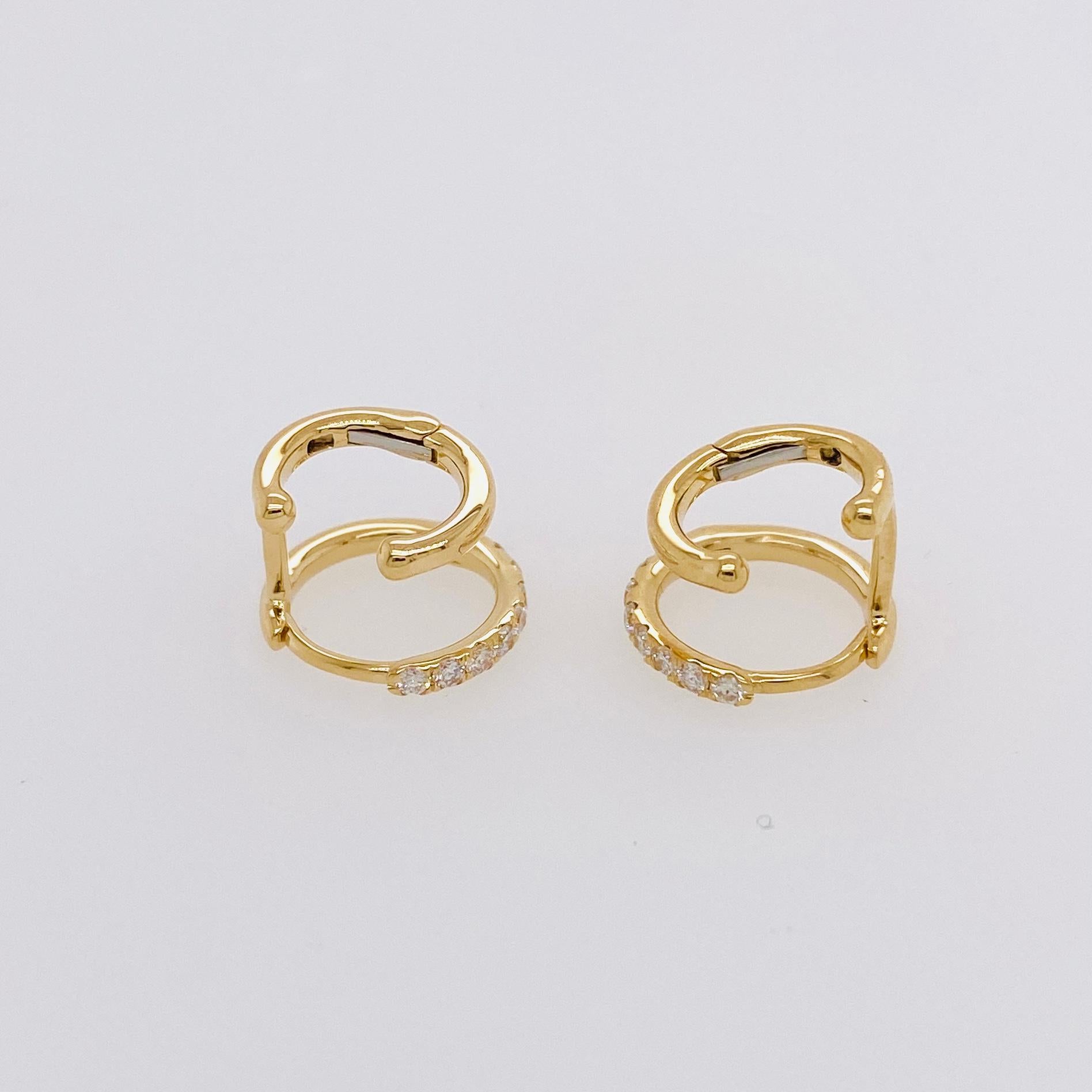 This double huggie earring looks like you have two piercings and two hoops on. The multi earring trend is here and with this earring you can just have one piercing and it looks like you have two! The earring has one hoop on each pair that is