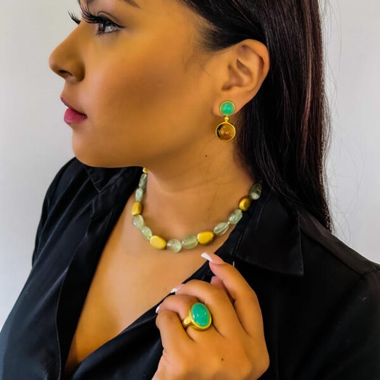 22k Gold Drop Earrings feature to bright Chrysoprase stones atop of deep colored Citrine stones. Hand made using the ancient art of goldsmithing. An old world look with a modern day vibe.  

The Tagili Promise: With every piece sold a portion of the