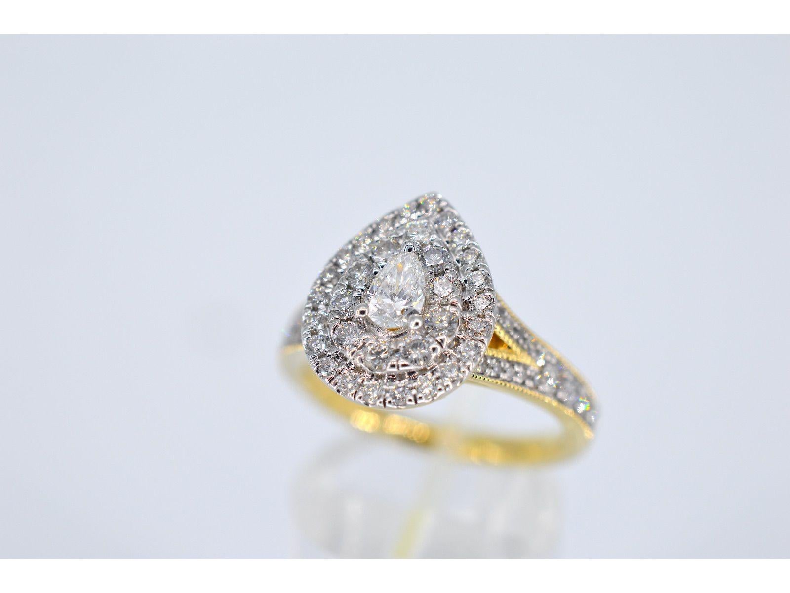 Contemporary Gold Drop-Shaped Entourage Ring with Diamonds For Sale