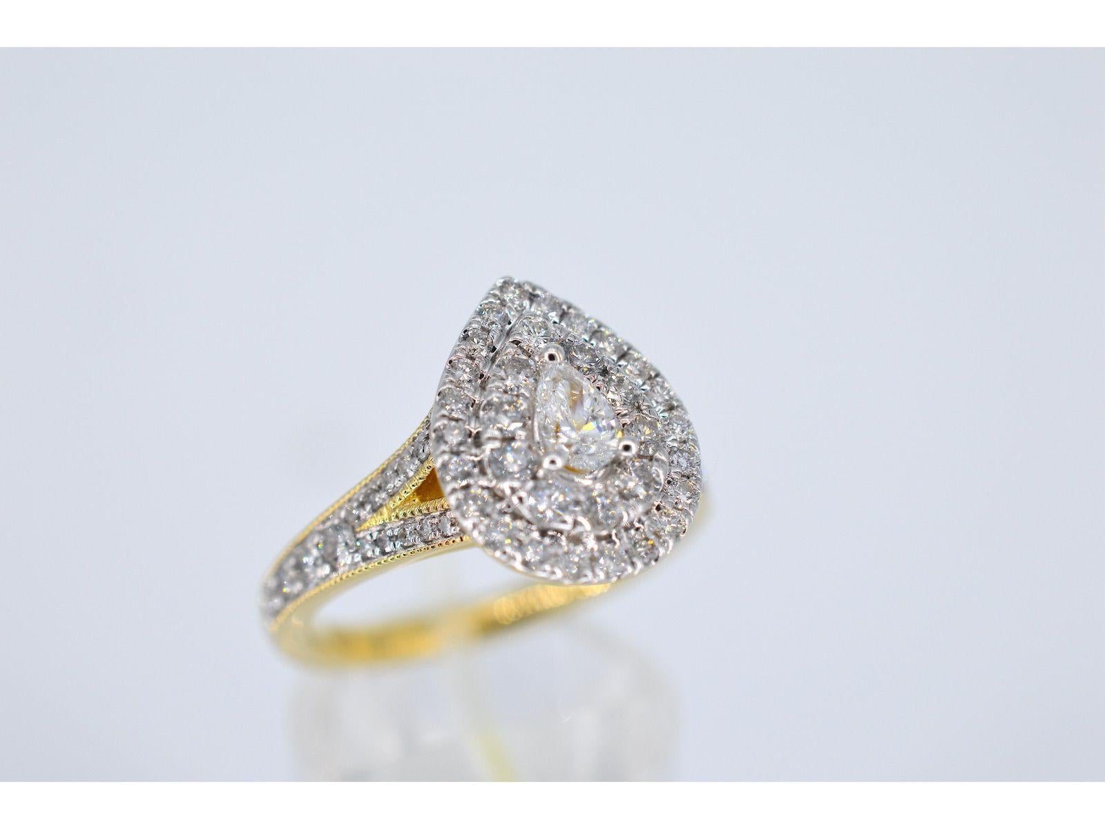 Brilliant Cut Gold Drop-Shaped Entourage Ring with Diamonds For Sale