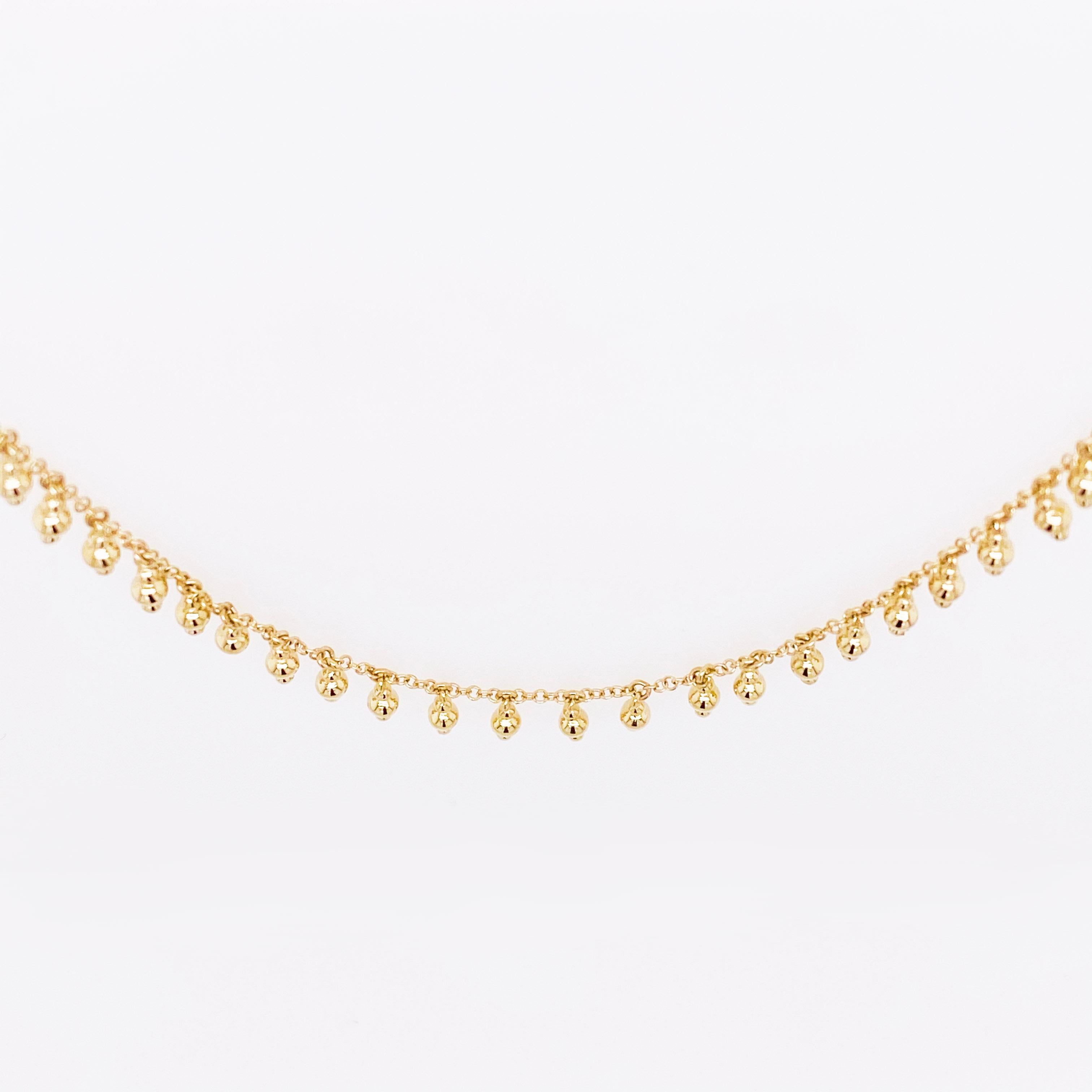 yellow gold bead station necklace