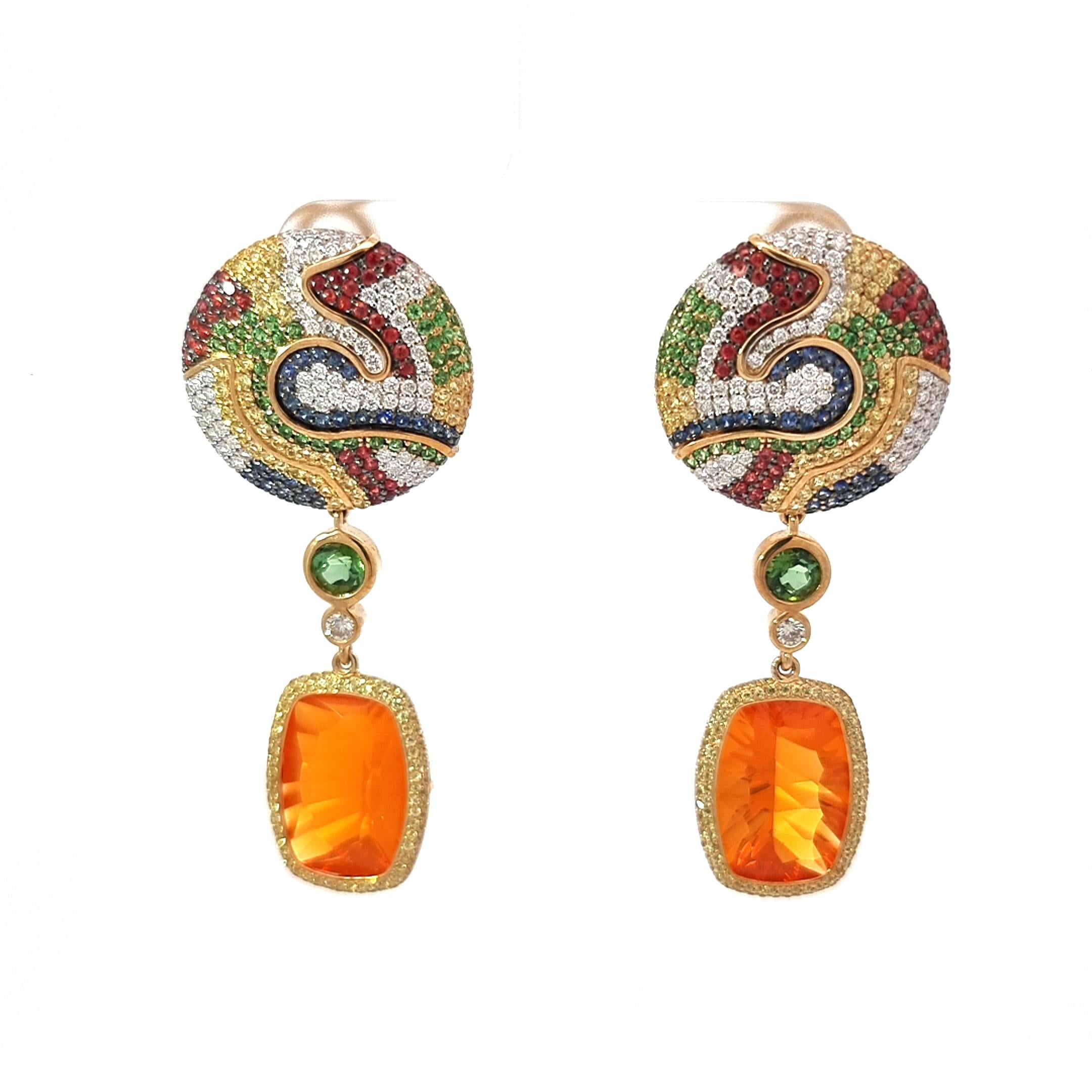 Africa collection by VOTIVE.

Mexican Fire Opals, Tourmalines, Tsavorites, Blue, Red and Yellow Sapphires, White Diamonds, 18k Yellow Gold.

Blending into vivid shades of reds, yellows, and oranges, Safari Sunrise earrings match the breathtaking
