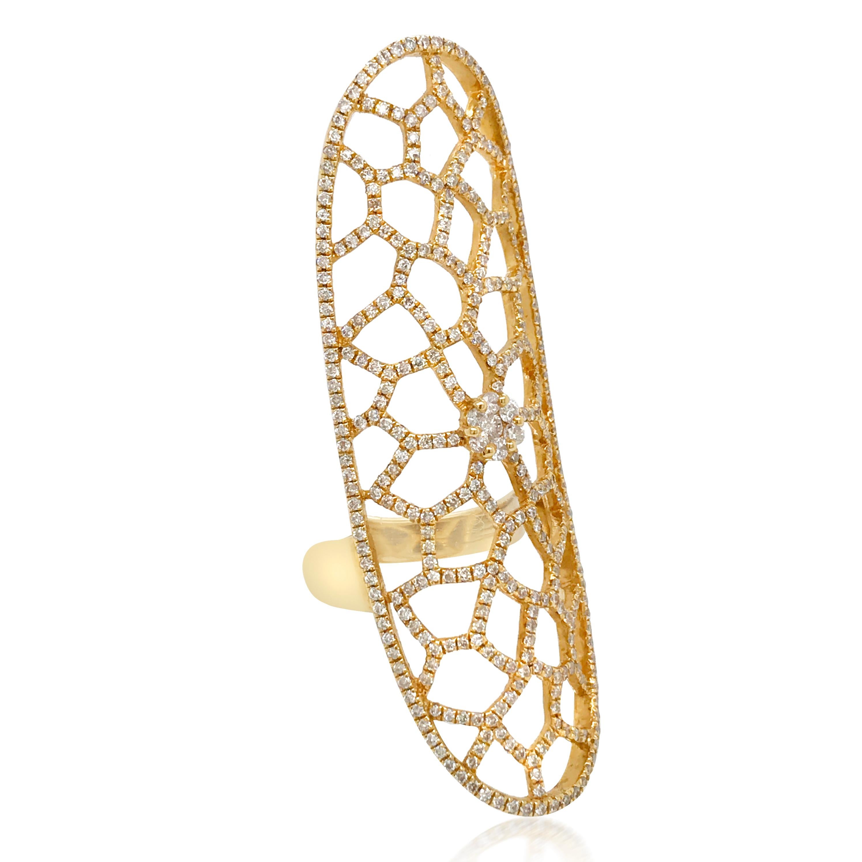 This artfully designed full-finger ring is crafted in 14K yellow gold, elongated filigree with approx. 1.5 carats of diamonds, SG. Signed Jacob and Co. Stamped D. The ring weighs 9.5 grams, is 55.4mm long, ring size 6.75.

Diamond total weight: