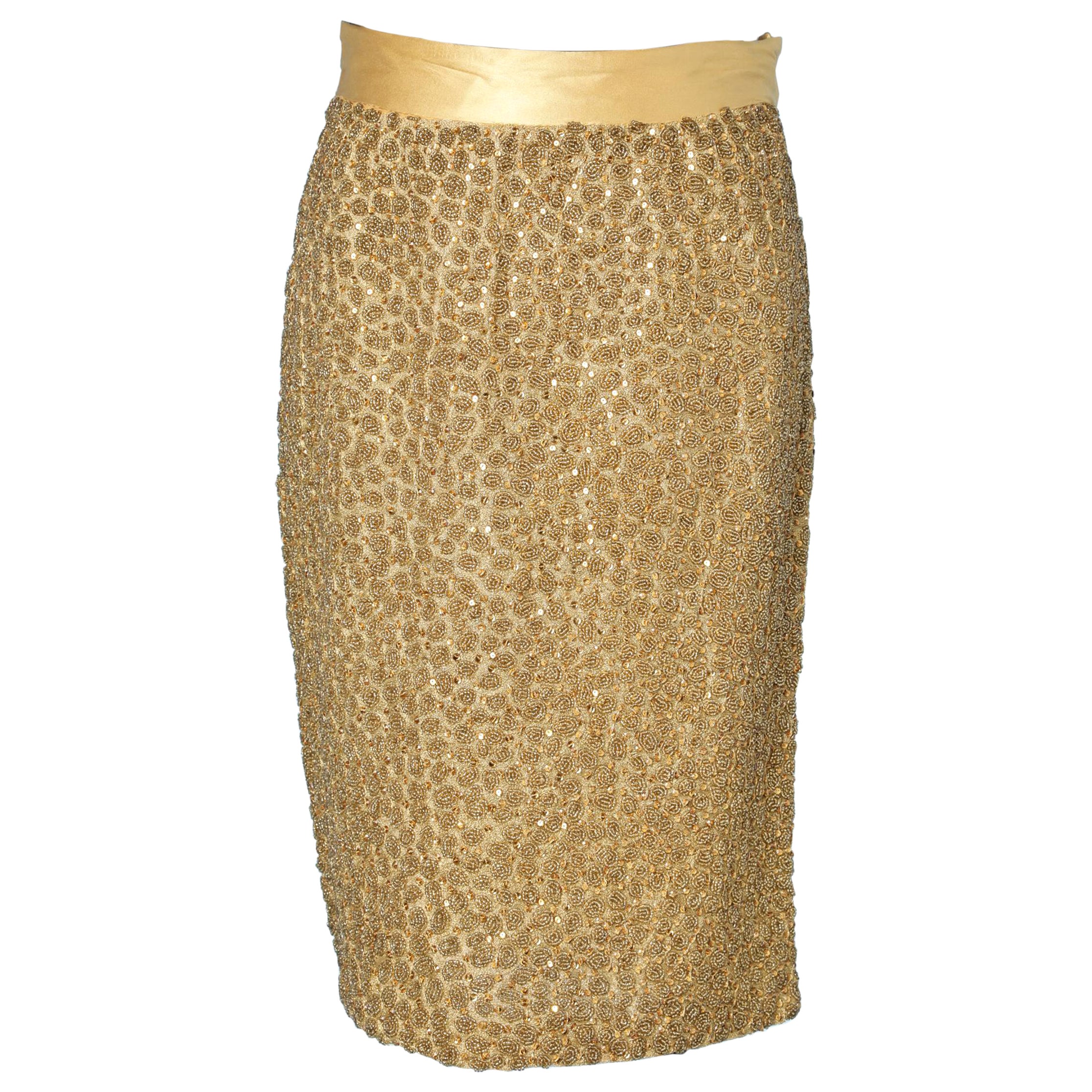 Falda lápiz bordada en oro  y cinturón de satén dorado Gianni Versace