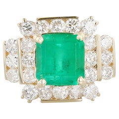 Anillo de oro, esmeralda y diamantes