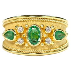 Gold Emerald Ring with Diamonds