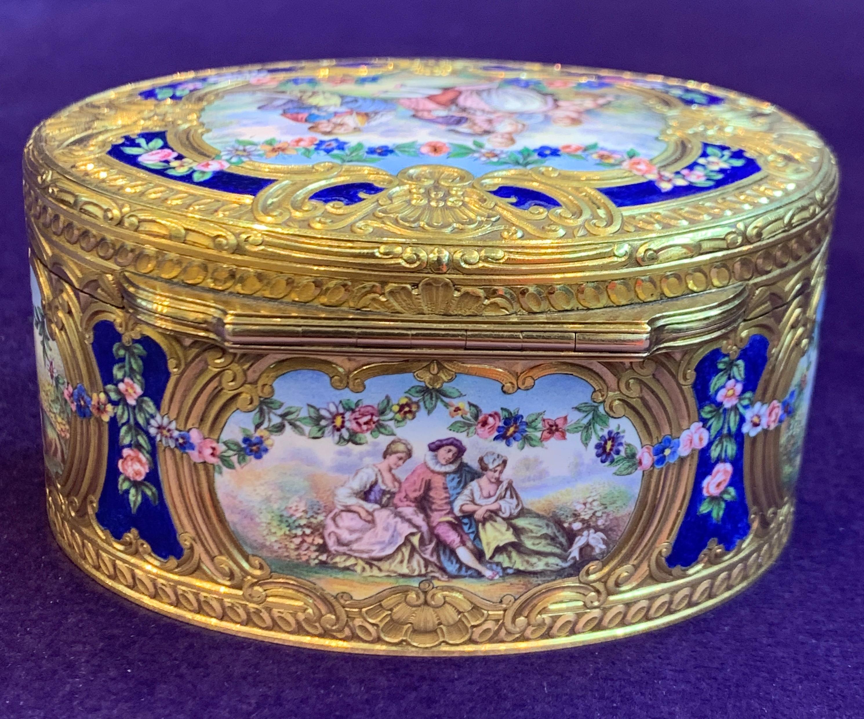 Gold Enamel  Antique Snuff Box
Measurements: 1.75” long,  3.75” wide,   9.5” inches in diameter
223.2 Grams
