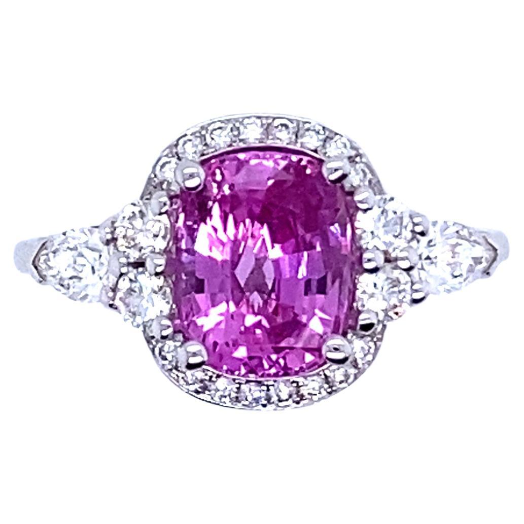 Gold Engagement Ring Surmounted by a Pink Sapphire Surrounded by Diamonds