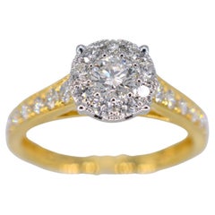 Bague entourage en or avec diamants taille brillant de 1,00 carat