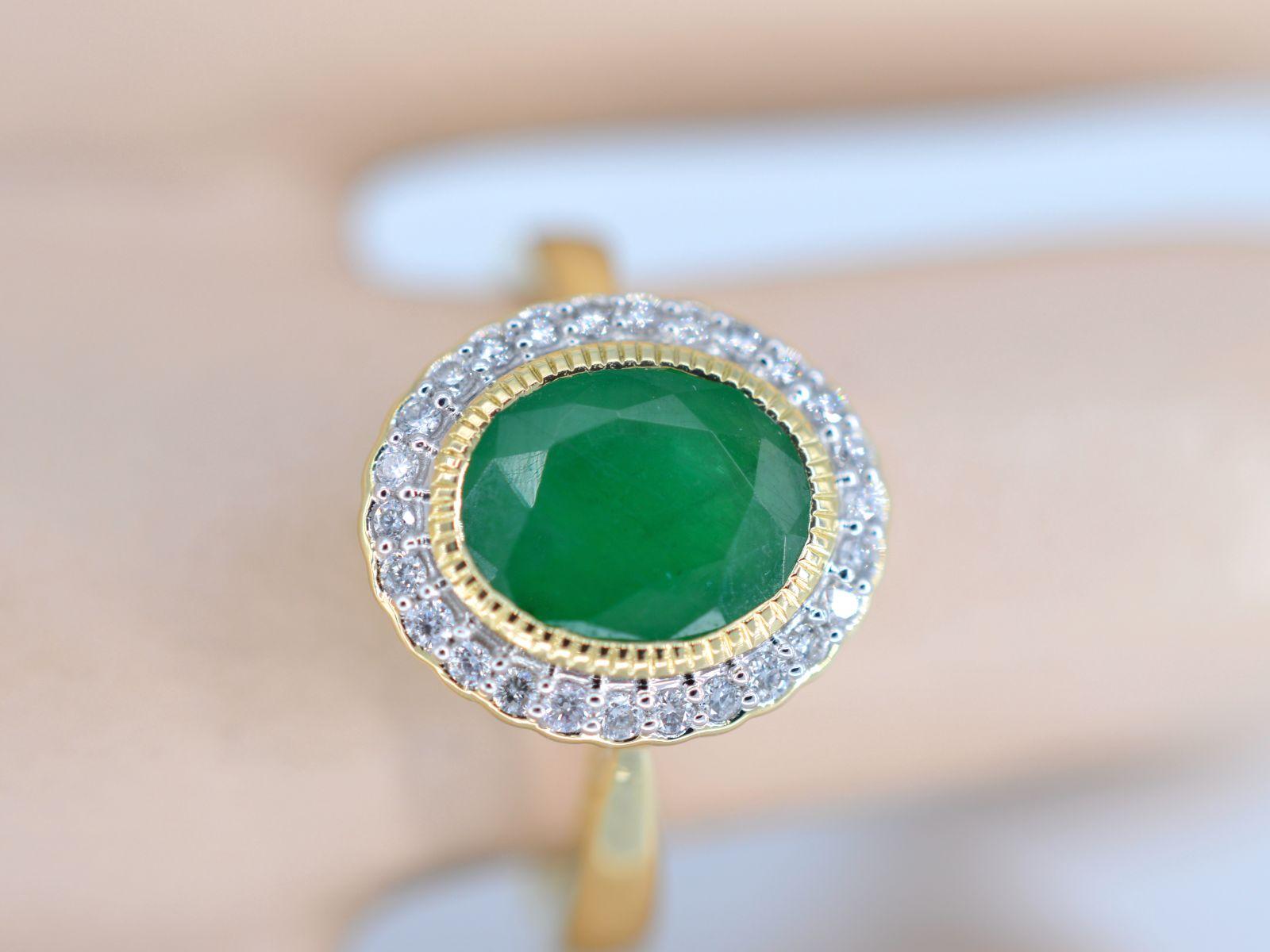 

Diamonds
Weight: 0.15 carat
Cut: Brilliant cut
Colour: F-G
Purity: SI-P
Quality: Very good

Gemstone: Emerald
Cut: Oval cut
Weight: 2.00 carats

Jewel: Ring
Weight: 4.0 grams
Hallmark: 14 karat 
Ring size: 54 (17.25 mm)
Condition: New

Retail