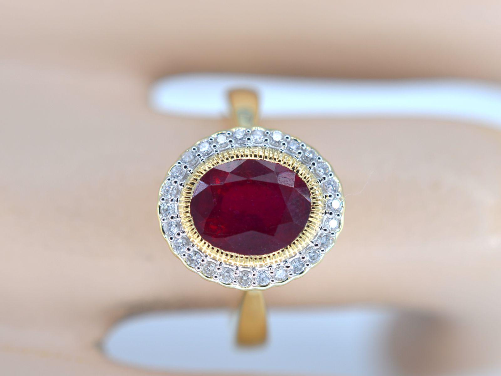 

Diamonds
Weight: 0.15 carat
Cut: Brilliant cut
Colour: F-G
Purity: SI-P
Quality: Very good

Gemstone: Ruby
Cut: Oval cut
Colour: Red
Weight: 2.50 carat

Jewel: Ring
Weight: 4.0 grams
Hallmark: 14 karat 
Ring size: 54 (17.25 mm)
Condition:
