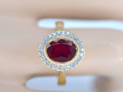 Gold Entourage Ring with Diamonds and Ruby