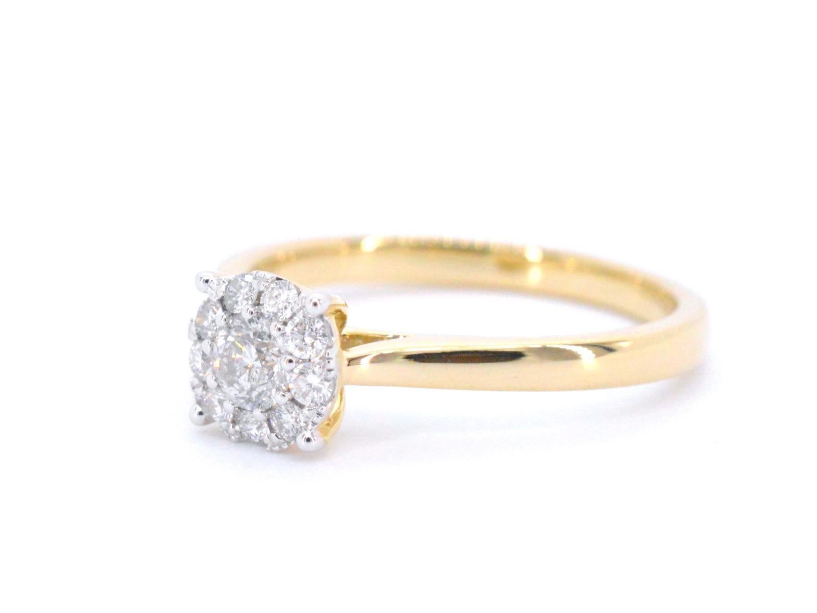 The yellow golden entourage ring with diamonds is a stunning piece of jewelry that features a combination of brilliant-cut diamonds. Crafted from 14K yellow gold, this ring has a timeless design that exudes elegance and sophistication. The entourage