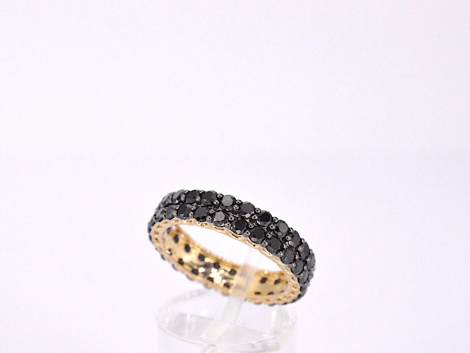 Brilliant Cut Gold Eternity Ring with Black Diamonds For Sale