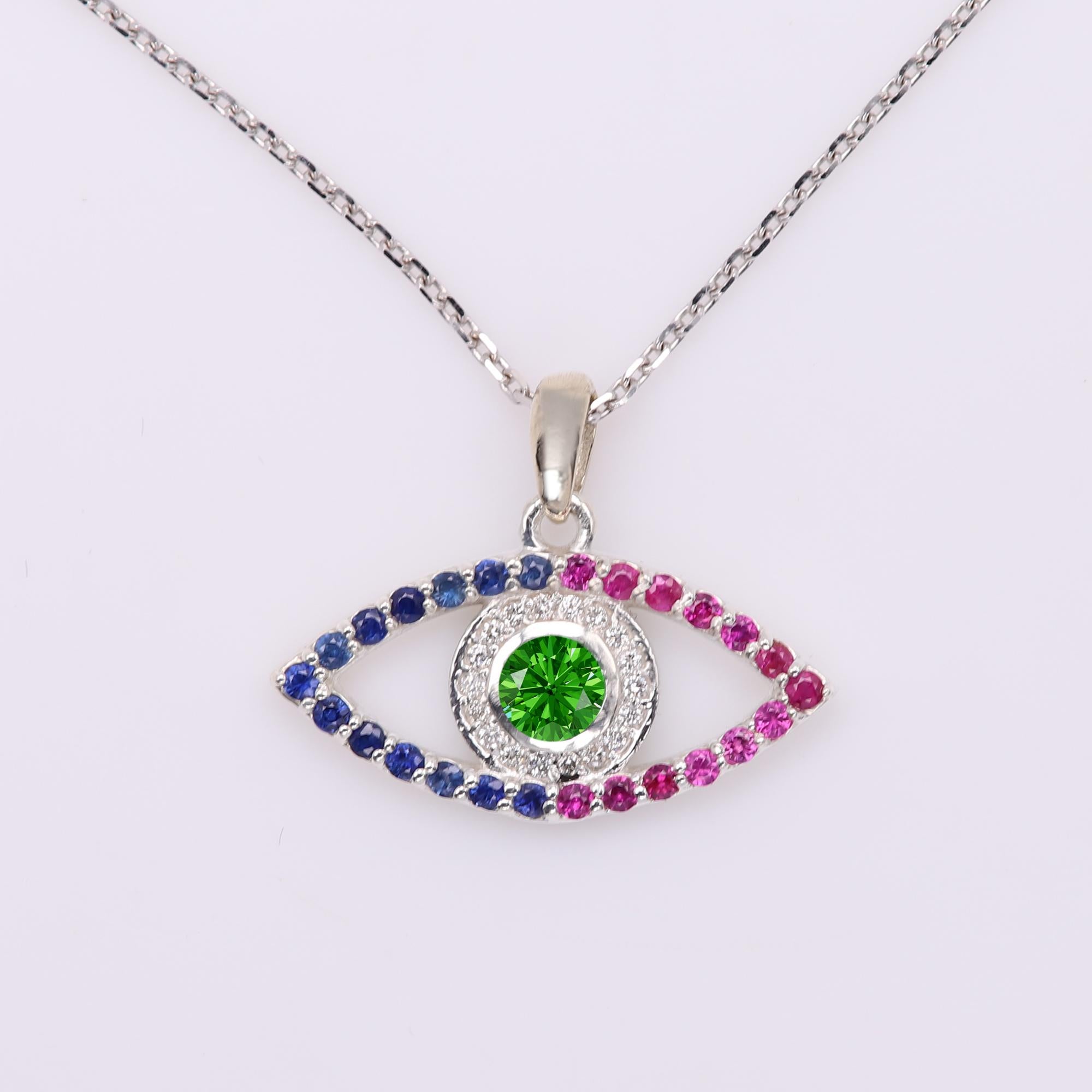 Gold Evil Eye 14 Karat White Gold Green Tsavorite Red and Blue Sapphire In New Condition For Sale In Brooklyn, NY