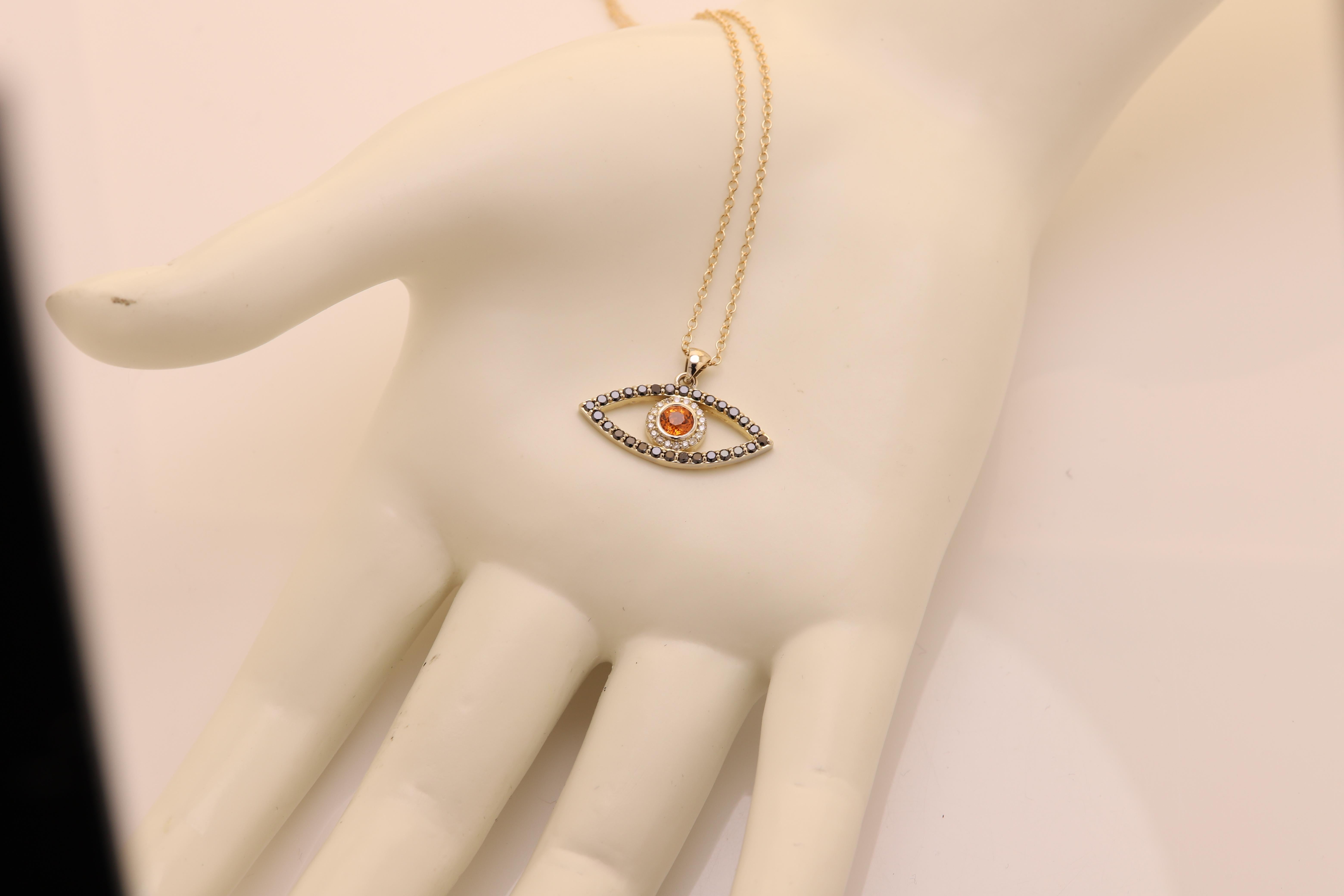 Gold Evil Eye 14 Karat Yellow Gold Black Diamonds and Orange Sapphire In New Condition For Sale In Brooklyn, NY
