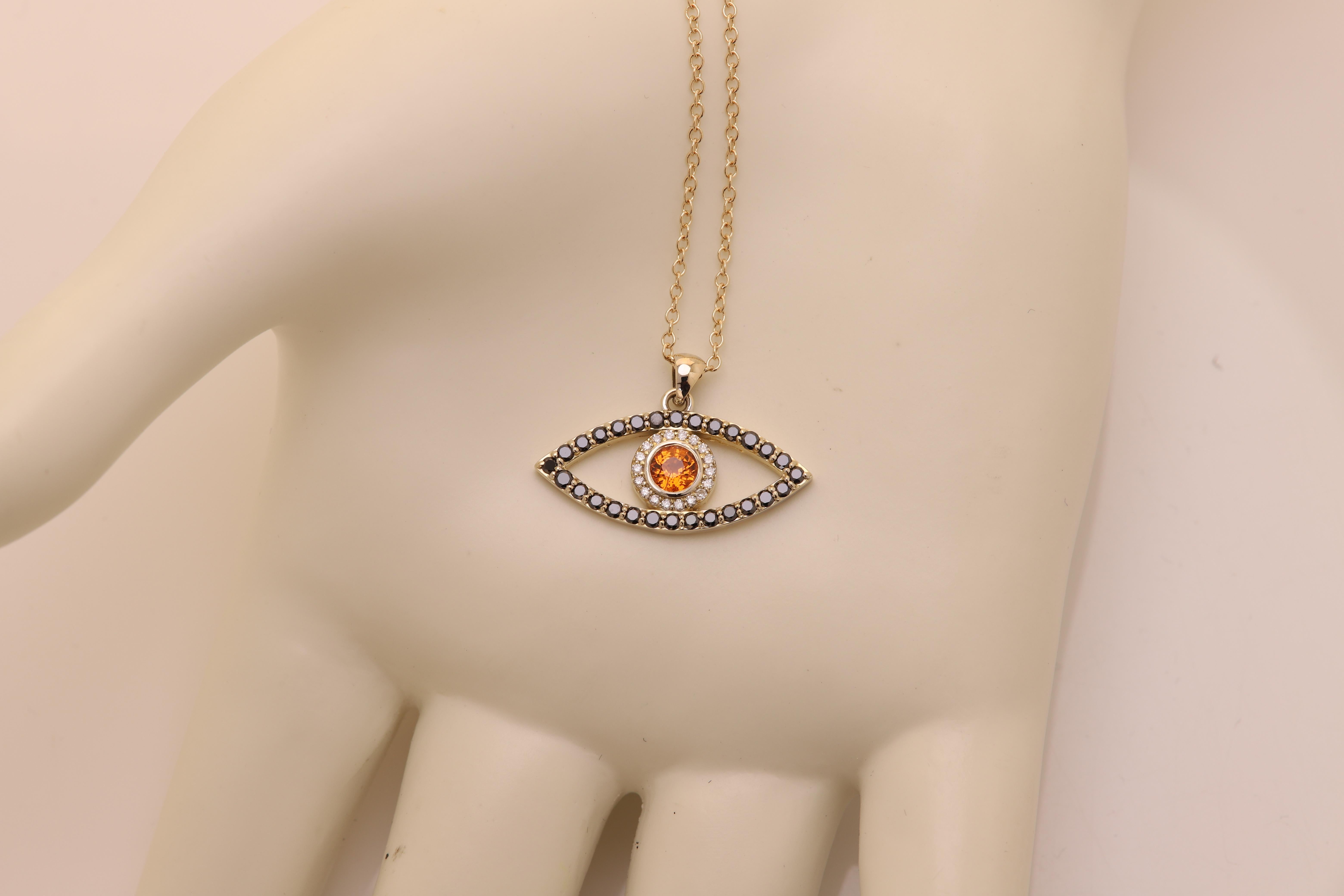 Women's or Men's Gold Evil Eye 14 Karat Yellow Gold Black Diamonds and Orange Sapphire For Sale