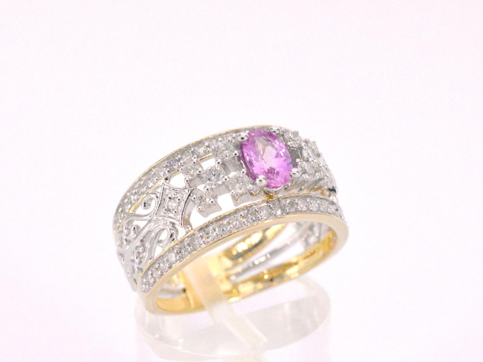 Women's Gold Exclusive Ring Full of Diamonds and a Gemstone For Sale