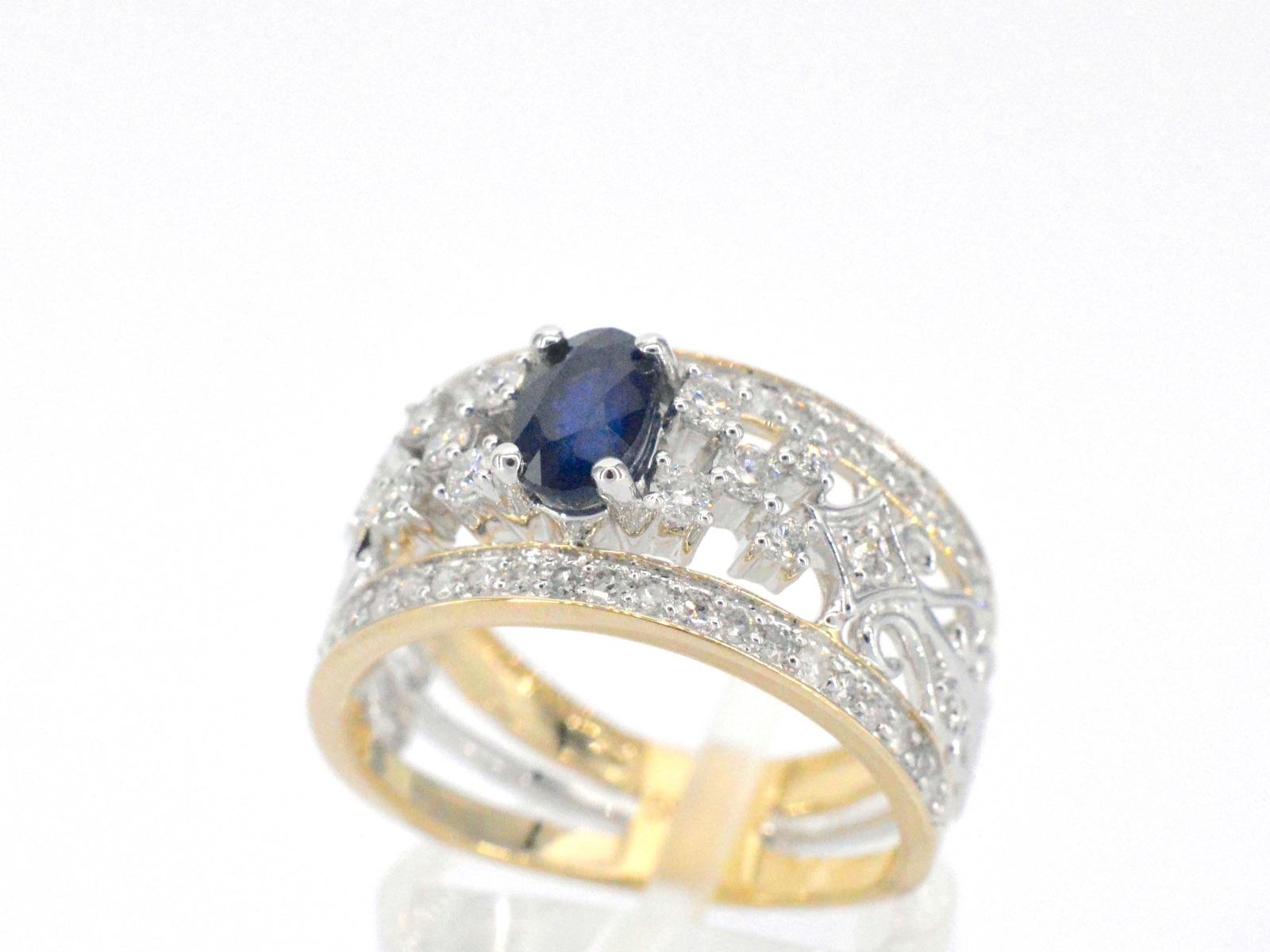 Gold Exclusive Ring Full of Diamonds and a Sapphire In New Condition For Sale In AMSTELVEEN, NH