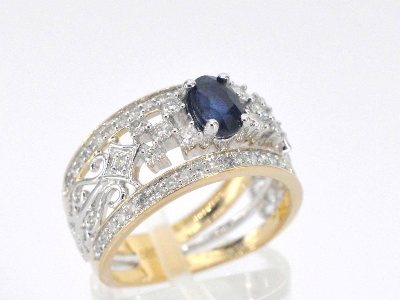 Women's Gold Exclusive Ring Full of Diamonds and a Sapphire For Sale