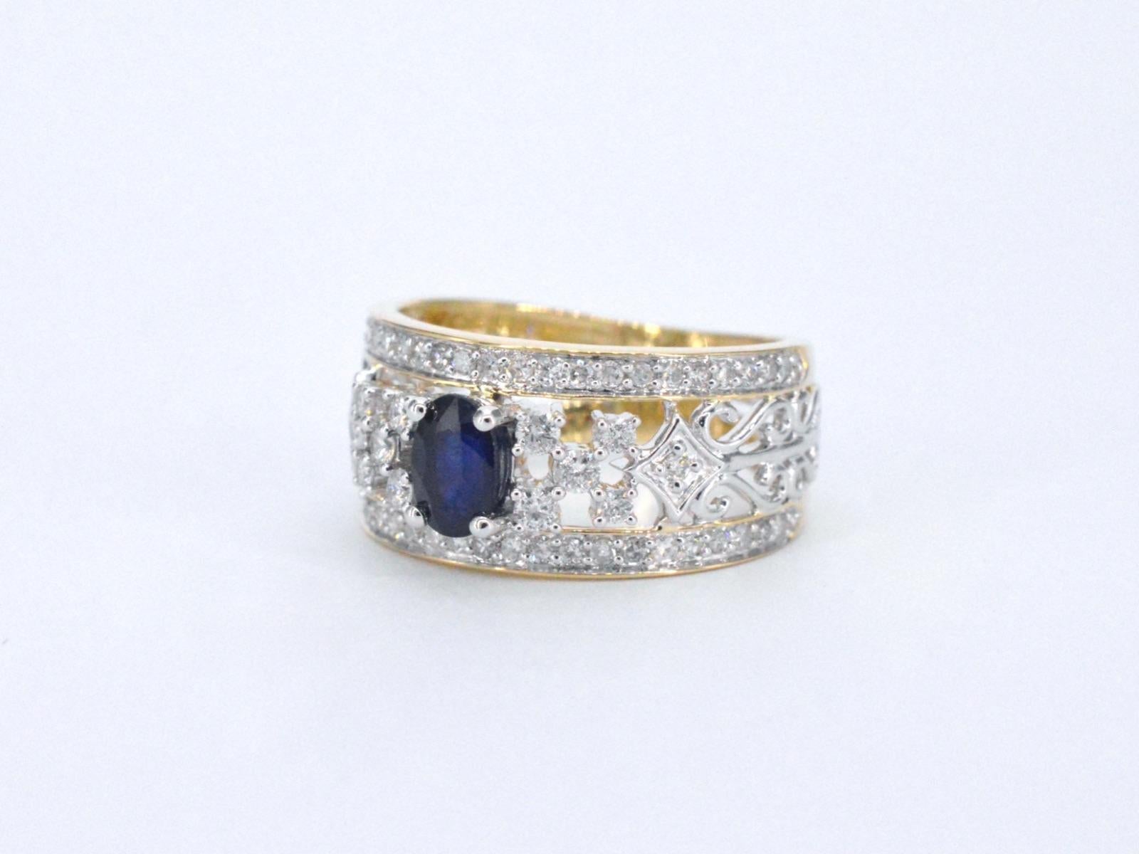 Gold Exclusive Ring Full of Diamonds and a Sapphire For Sale 2