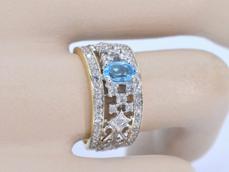 Gold Exclusive Ring Full of Diamonds and a Topaz For Sale at 1stDibs