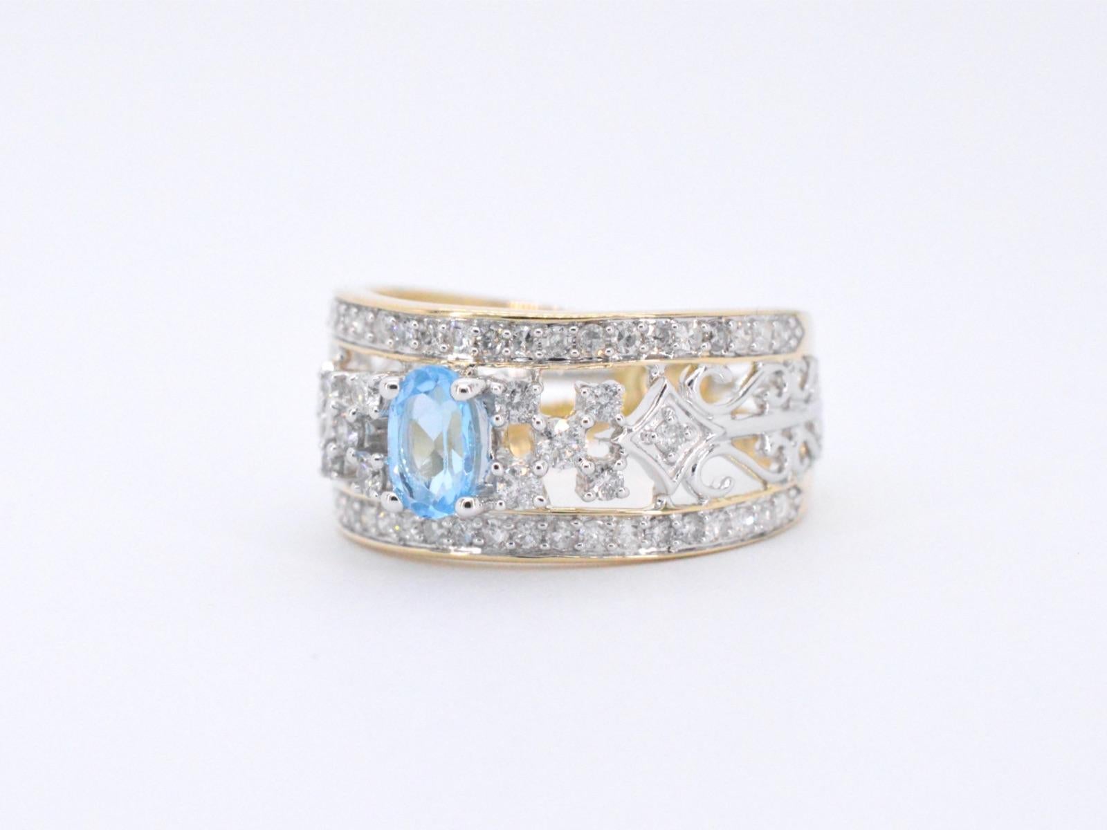 Gold Exclusive Ring Full of Diamonds and a Topaz For Sale 2