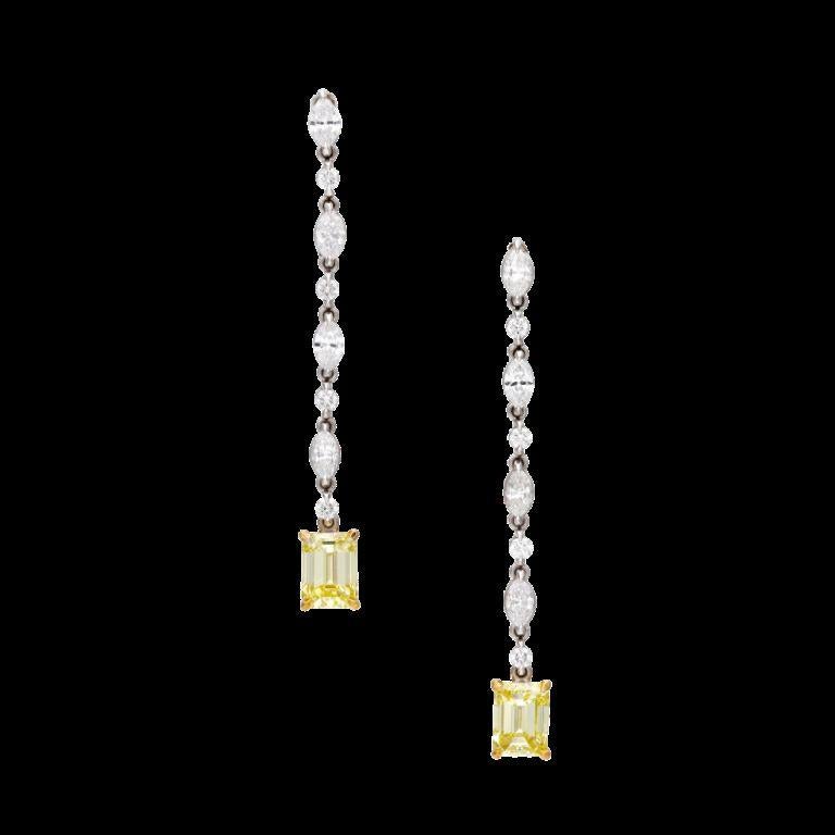 Fancy Intense Yellow diamonds suspending from alternating marquise and round brilliant cut diamonds. 
- Fancy Intense Yellow diamonds weighing a total of 2.24 carats 
- Round and marquise diamonds weighing a total of approximately 1.15 carats
 -