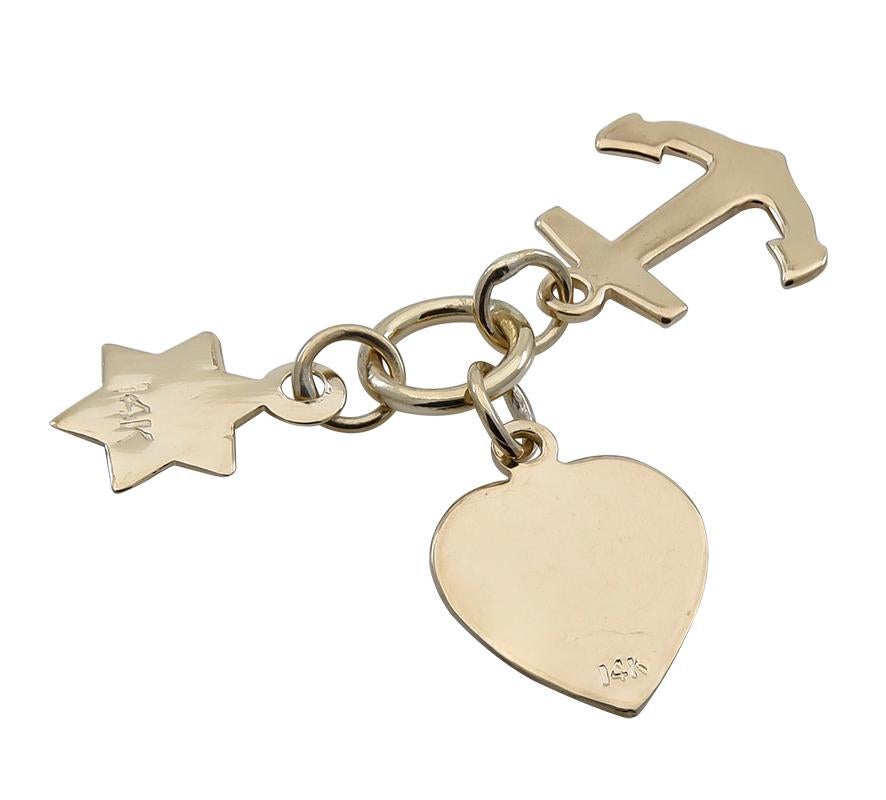 Unusual Faith Hope and Charity charm with a Star of David.  14K yellow gold.  1/2