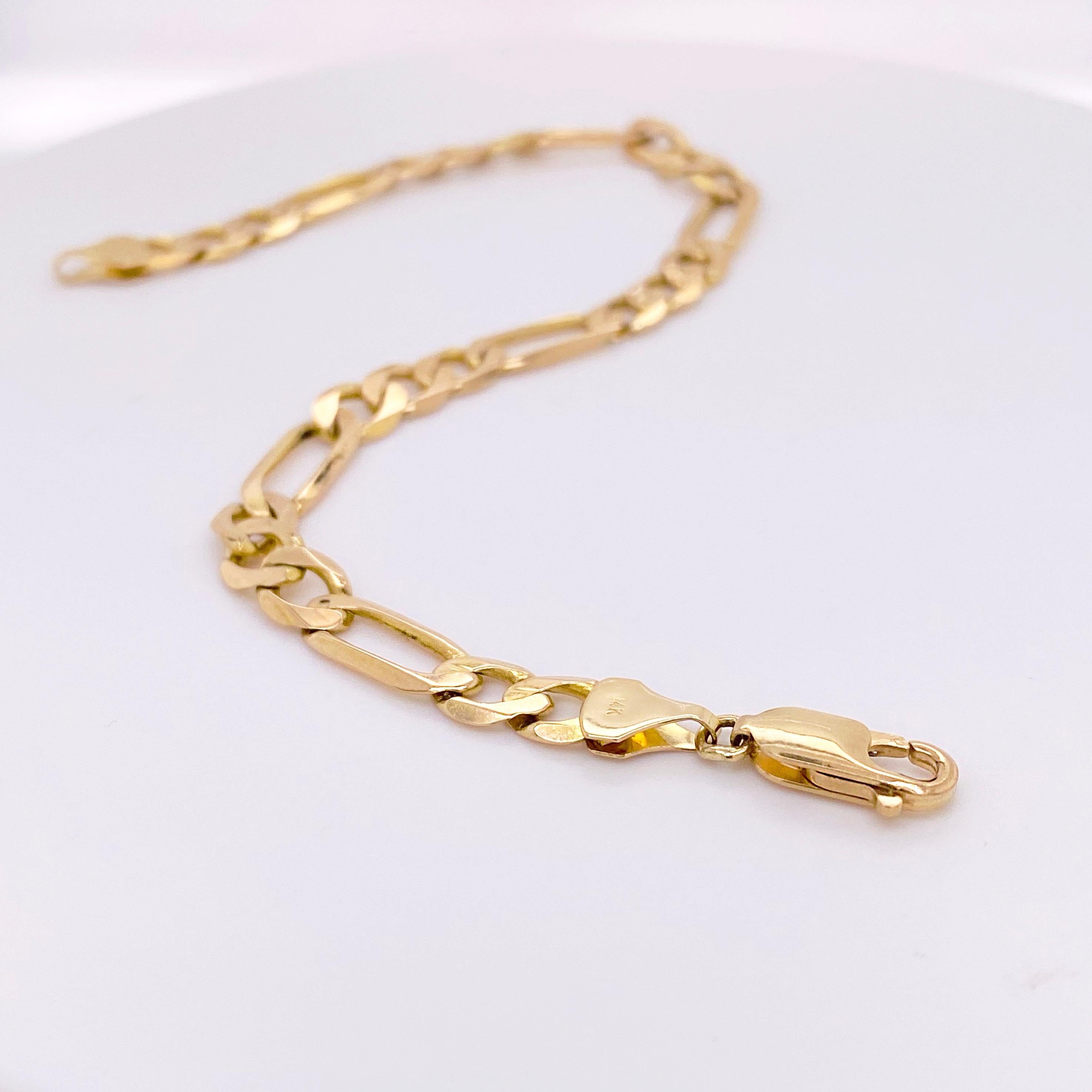 14 karat gold figaro bracelet
