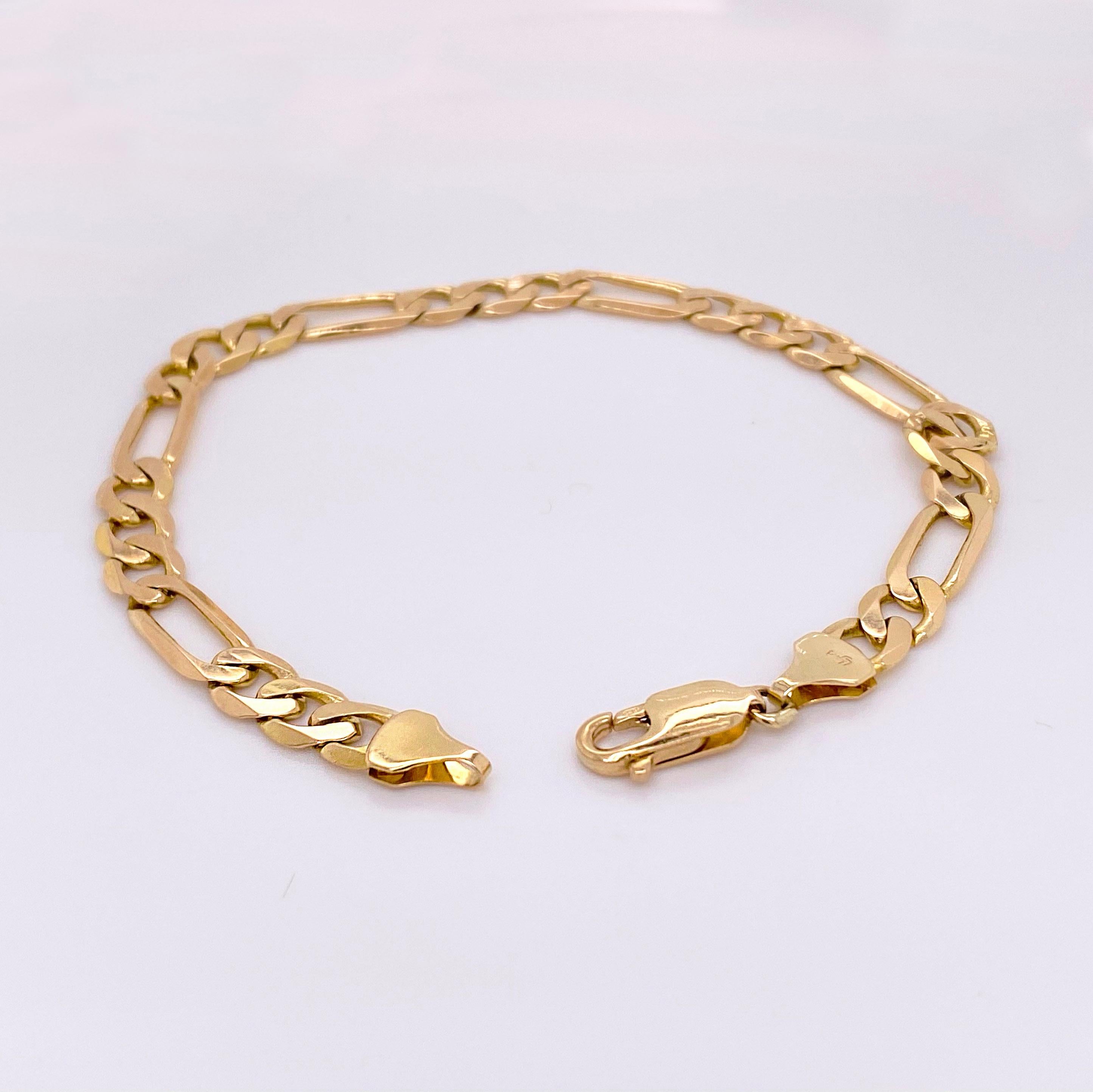 14 karat gold charm bracelet