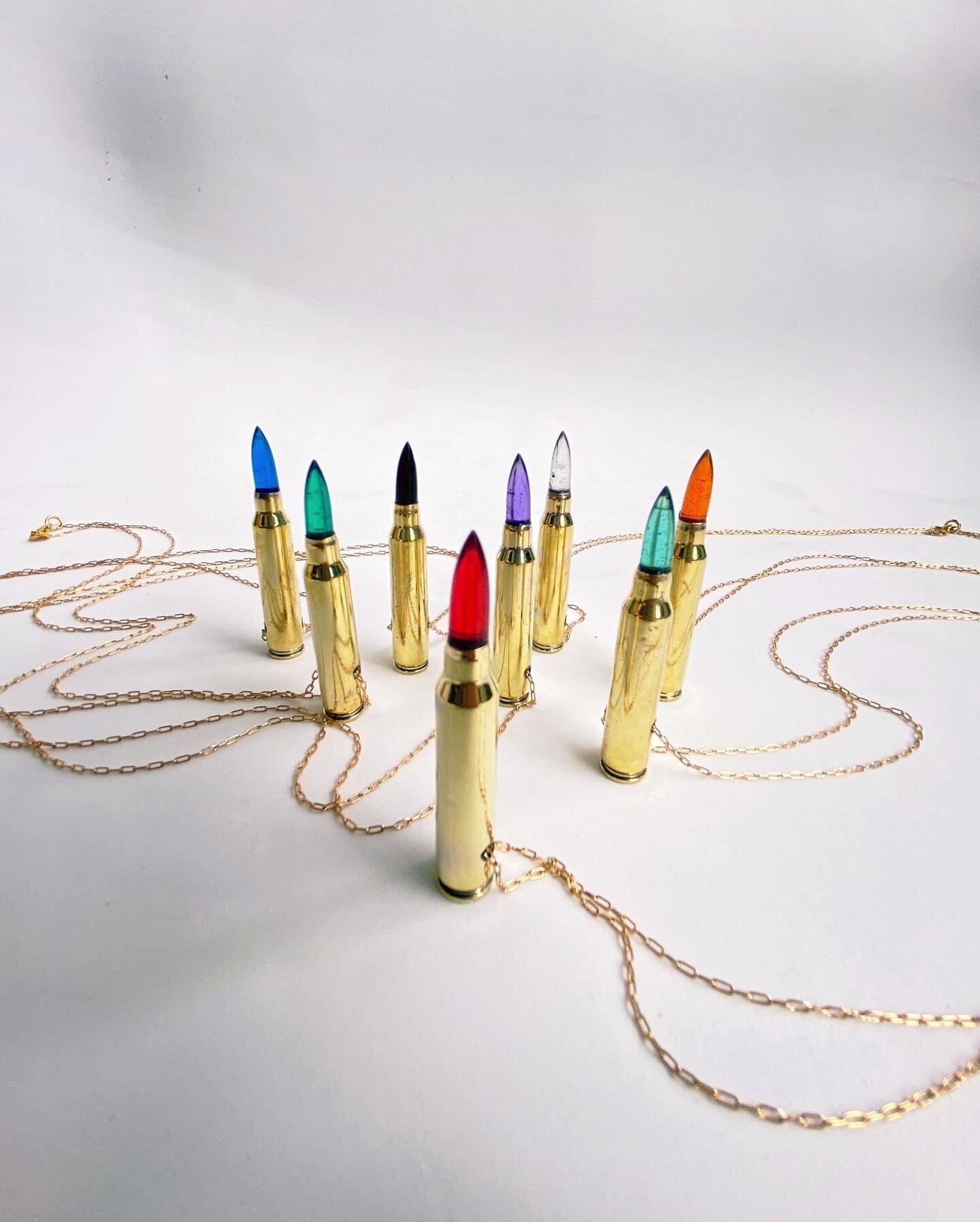 These unique chain pendants are made using gold filled stainless steel chain and feature a gold filled bullet set with colored resin of your choice (custom colors available ) These statement pieces come from the War & Peace collection by Sebastian