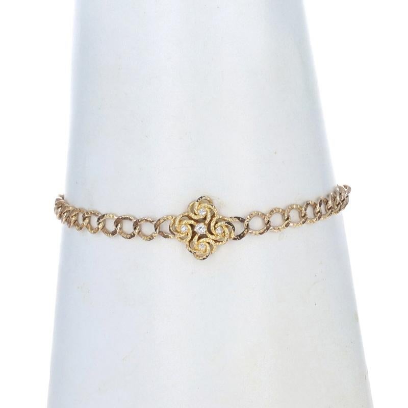 Era: Victorian
Date: 1870s - 1880s

Metal Content: Gold Filled

Stone Information
Natural Diamonds
Carat(s): .12ctw
Cut: Mine
Color: G - H
Clarity: SI1 - SI2

Total Carats: .12ctw

Chain Style: Fancy Curb
Bracelet Style: Chain Station
Fastening