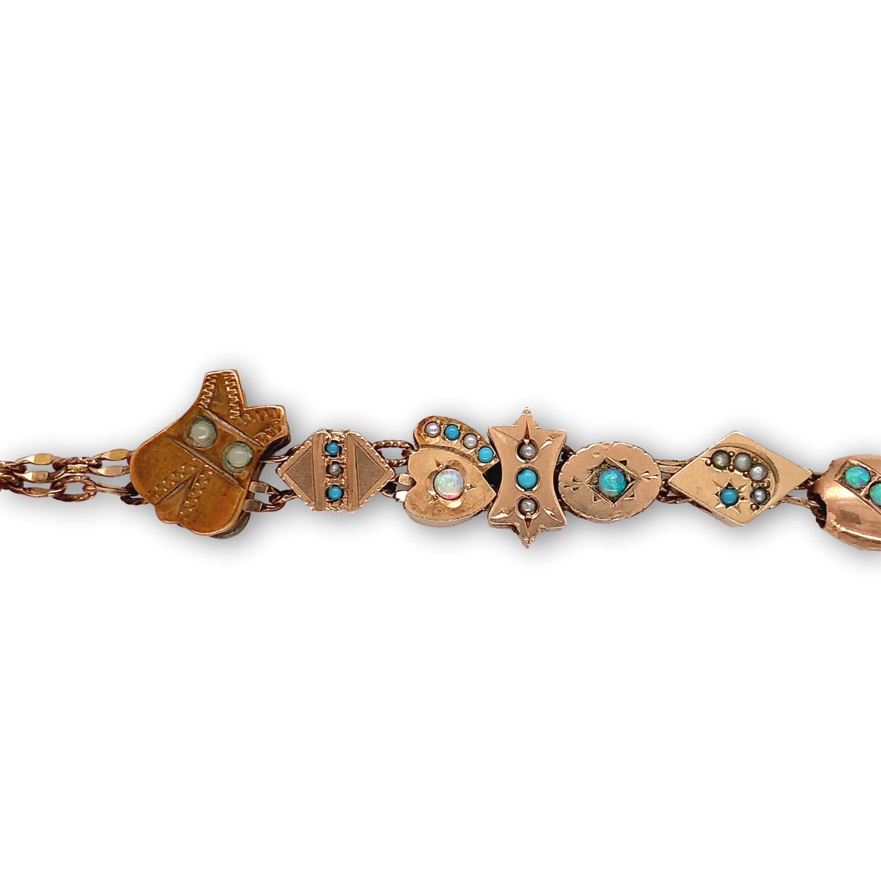 Gold gefüllt Armband mit Gold gefüllt und Gold oben Vielfalt der 16 viktorianischen Uhrenkette schiebt. Die Dias sind mit kleinen runden Opalen, Türkisen und Saatperlen verziert. Ich vermute, die türkisfarbenen Steine sind aus Glas. Das Armband