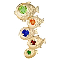 Gold Fish pendant with natural gemstones. 