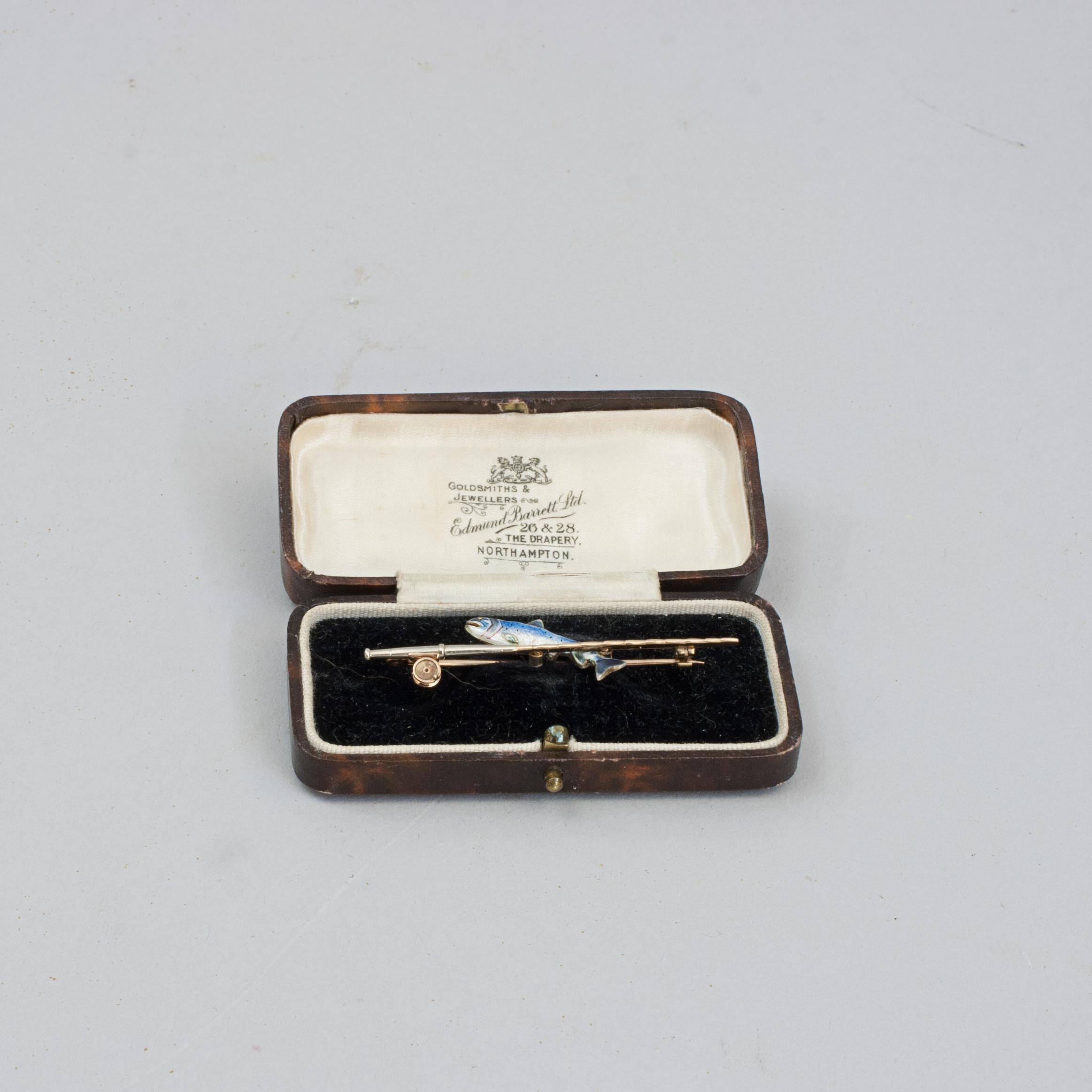 Gold, Silver & Enamel Rainbow Trout Fishing Brooch.
An exquisite 9 Carat gold fishing brooch by Alabaster & Wilson, Birmingham's Jewellery Quarter (established in 1887). The fishing rod is of particularly fine detail and made using both yellow and