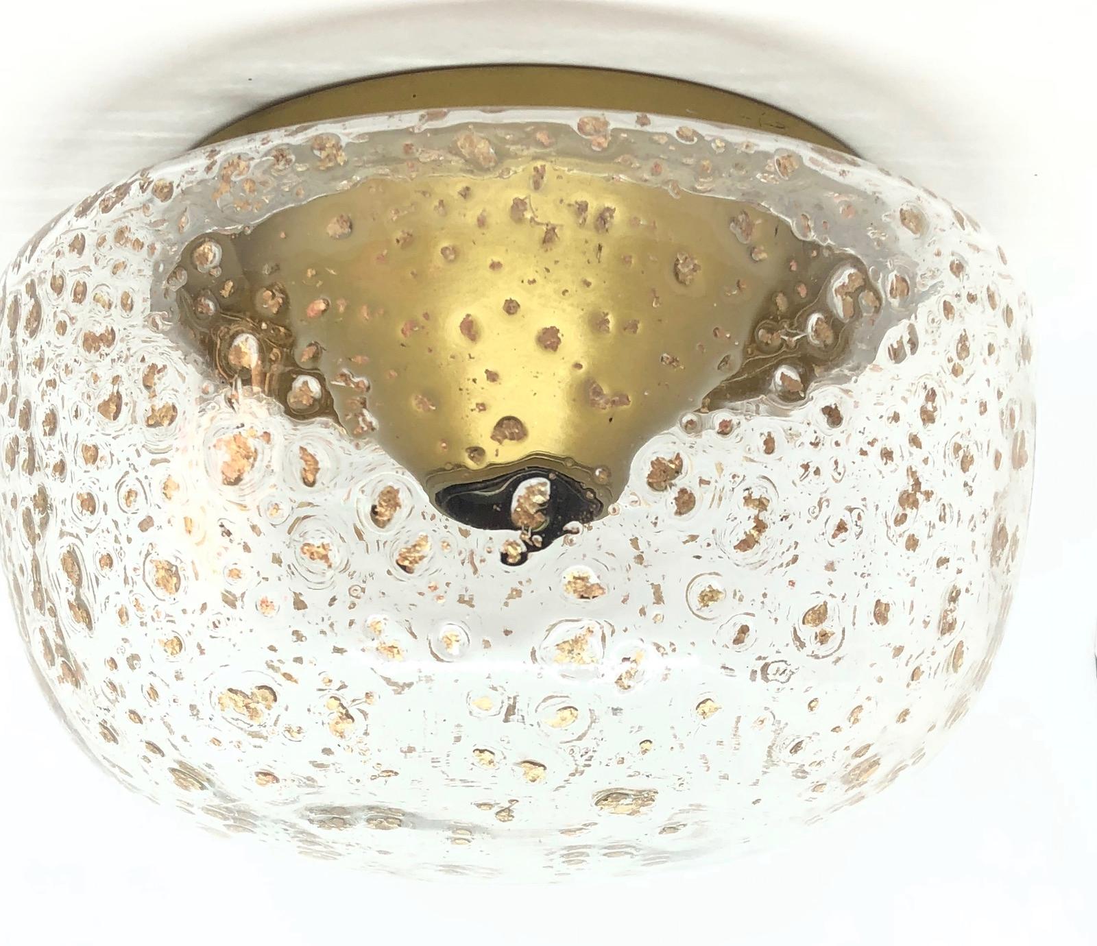 Beautiful bubble and golden flake flush mount. Made in Germany by Glashuette Limburg. Gorgeous textured glass flush mount with metal fixture. The fixture requires one European E27 Edison bulb up to 100 watts.