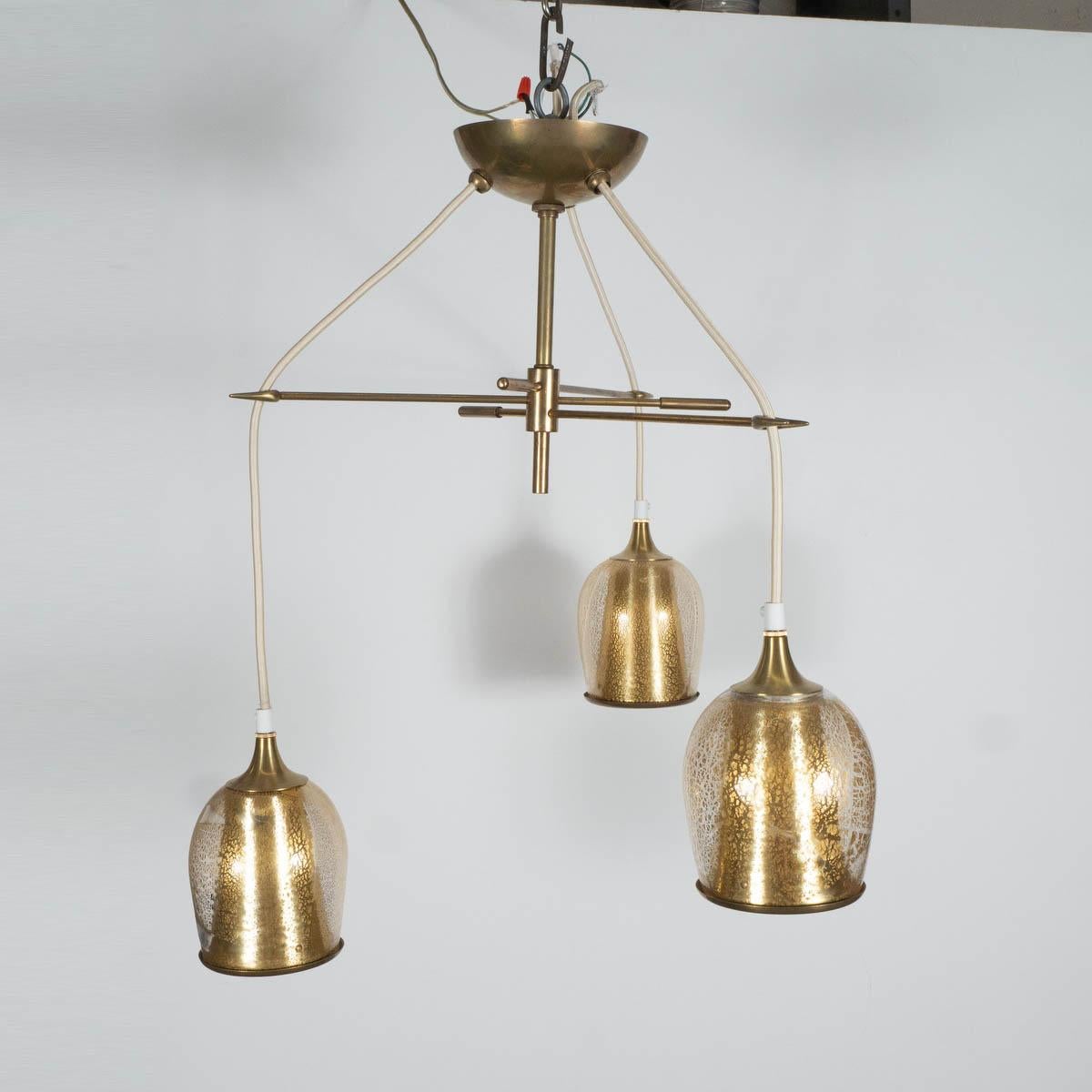 Brass chandelier frame with adjustable cords ending in gold-flecked Murano glass shades. Measured as shown.