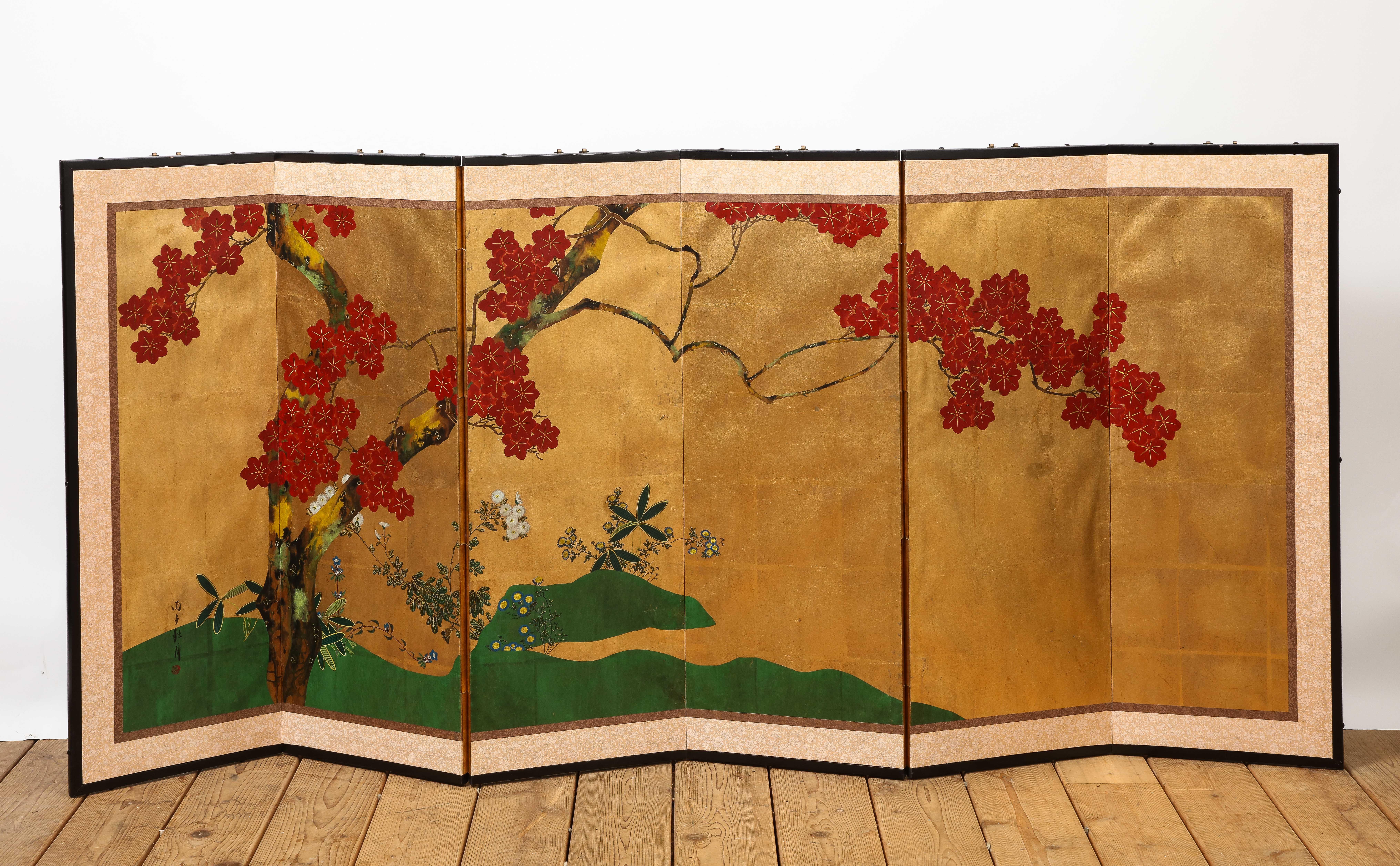 Gold vibrant floral-detailed DeGournay Chinoiserie Style six-panel screen. Paper scenery on one side, wood frame and backing. 20th century French. Hanging hardware along the top. 