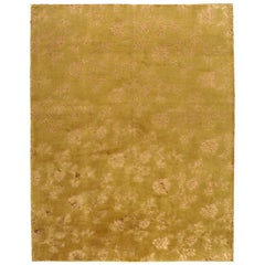Tapis de laine et de soie à motifs floraux dorés