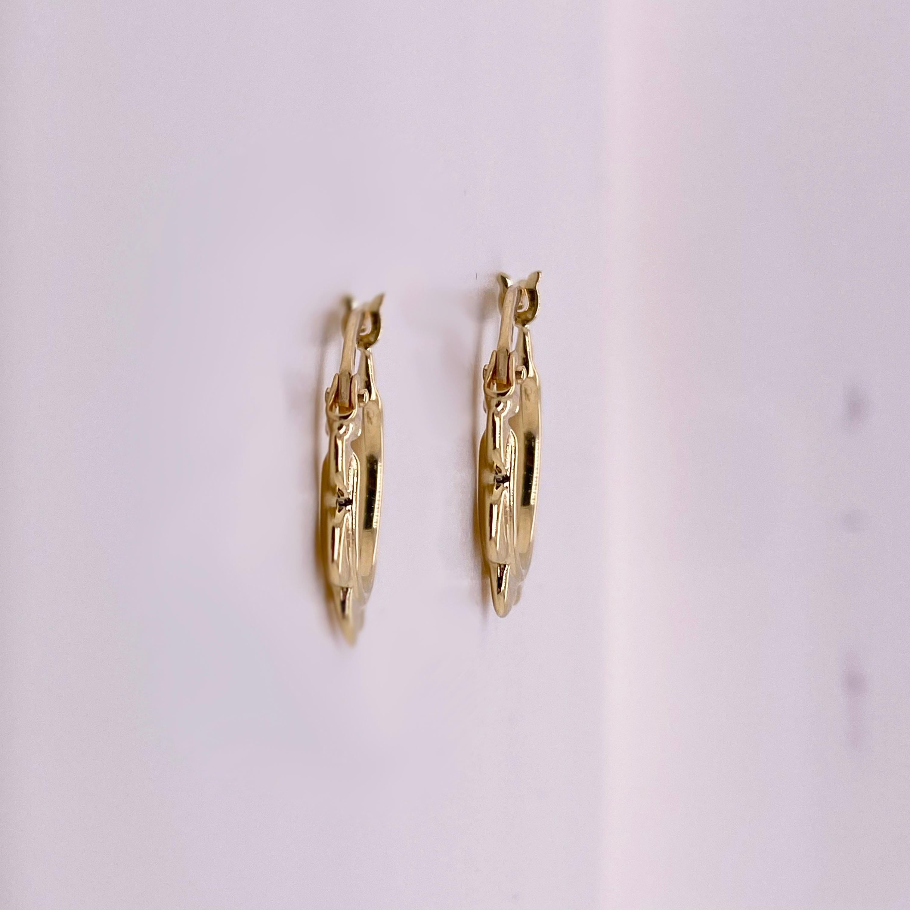 How cute are these mini hoop earrings? This season treat yourself to the latest fashion trend - MINI HOOP EARRINGS! With a high polish finish, the 14 karat yellow gold earring are smooth and shiny! These pair perfectly with every accessory. If you