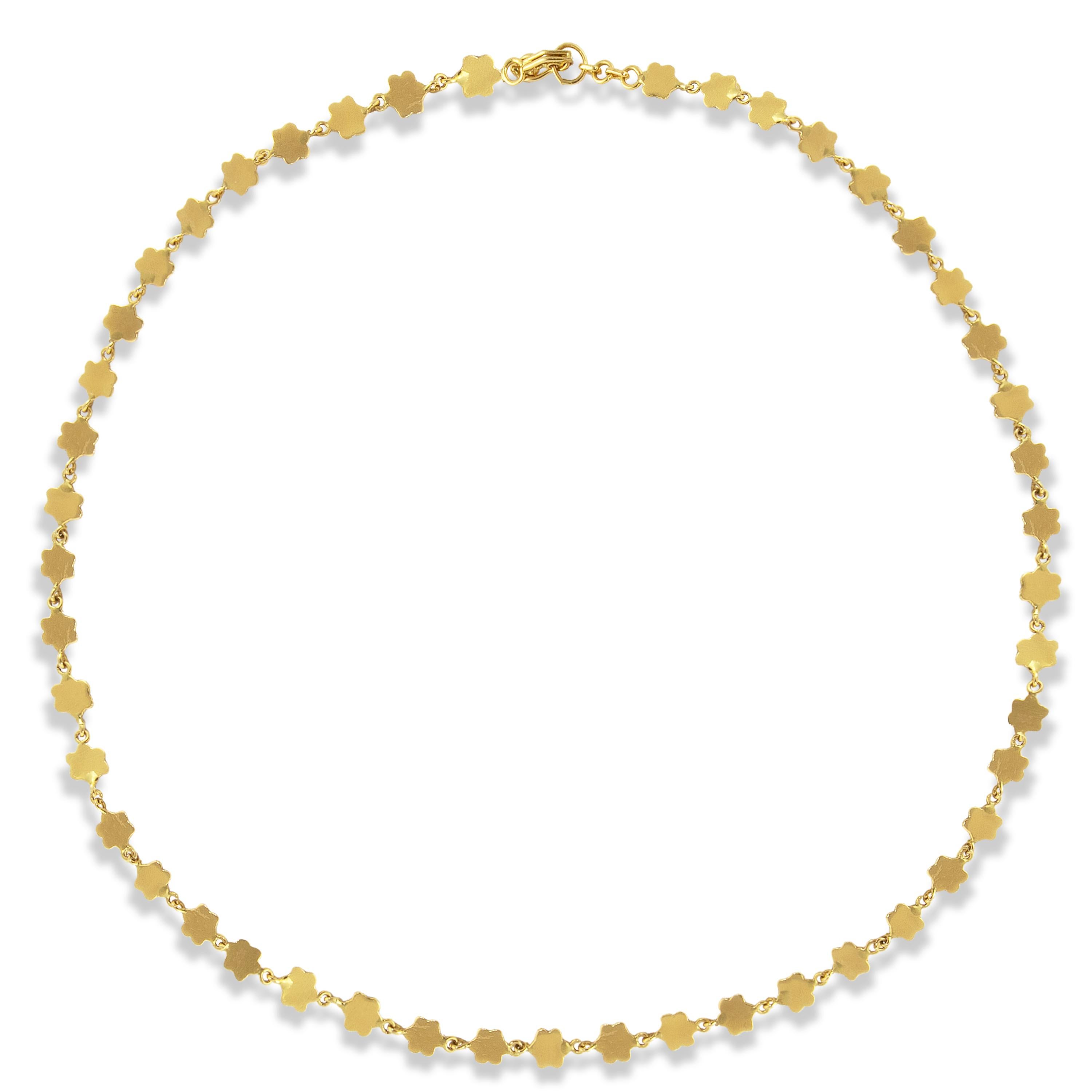 This 22k gold floral sequin necklace features fifty-one 6-petal flowers with a hook closure.  Each flower measures 6mm and the necklace is finished with a high polish.  A perfect everyday piece to wear alone or layered with other